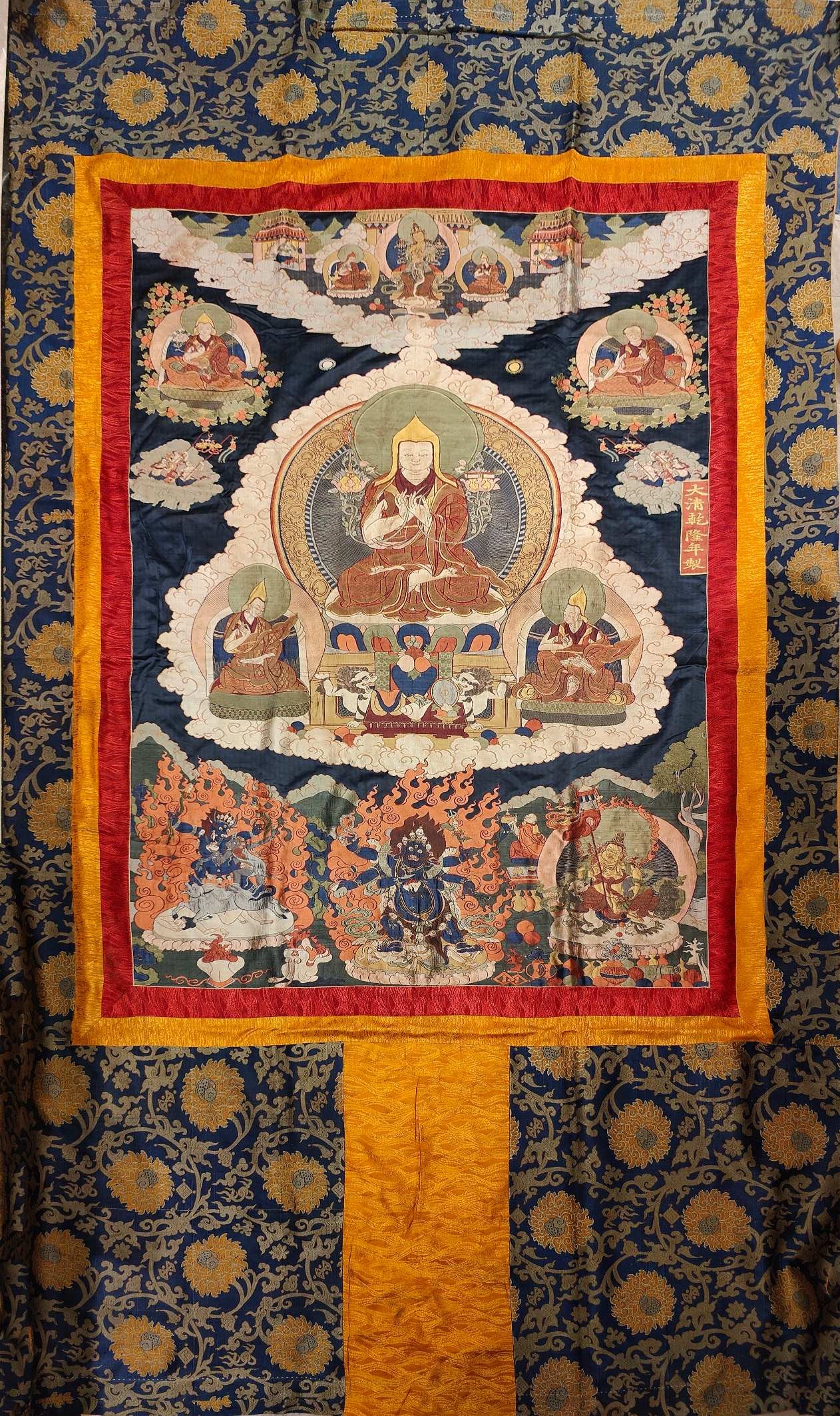 Yunjin Tsongkhapa Statue Thangka: Yunjin Tsongkhapa portrait thangka from the Qing Dynasty. Size: 118.1in×68.9in. Tsongkhapa’s Buddhist name is Lobsang Drakpa, which means good wisdom. He is the founder of the Gelug Sect of
