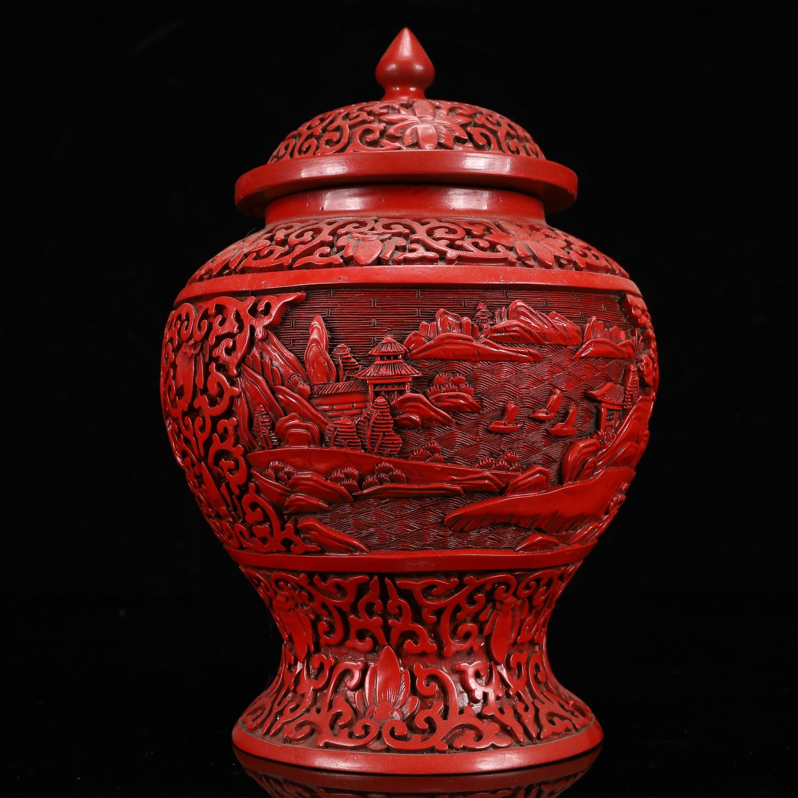 An Exquisite Carved Red Lacquer Landscape Pattern Vase with Cover: An Exquisite Carved Red Lacquer Landscape Pattern Vase with Cover,Qing Dynasty, China,Size:6.7inx9.4in,Weight:900g 剔红漆器山水纹盖瓶,中