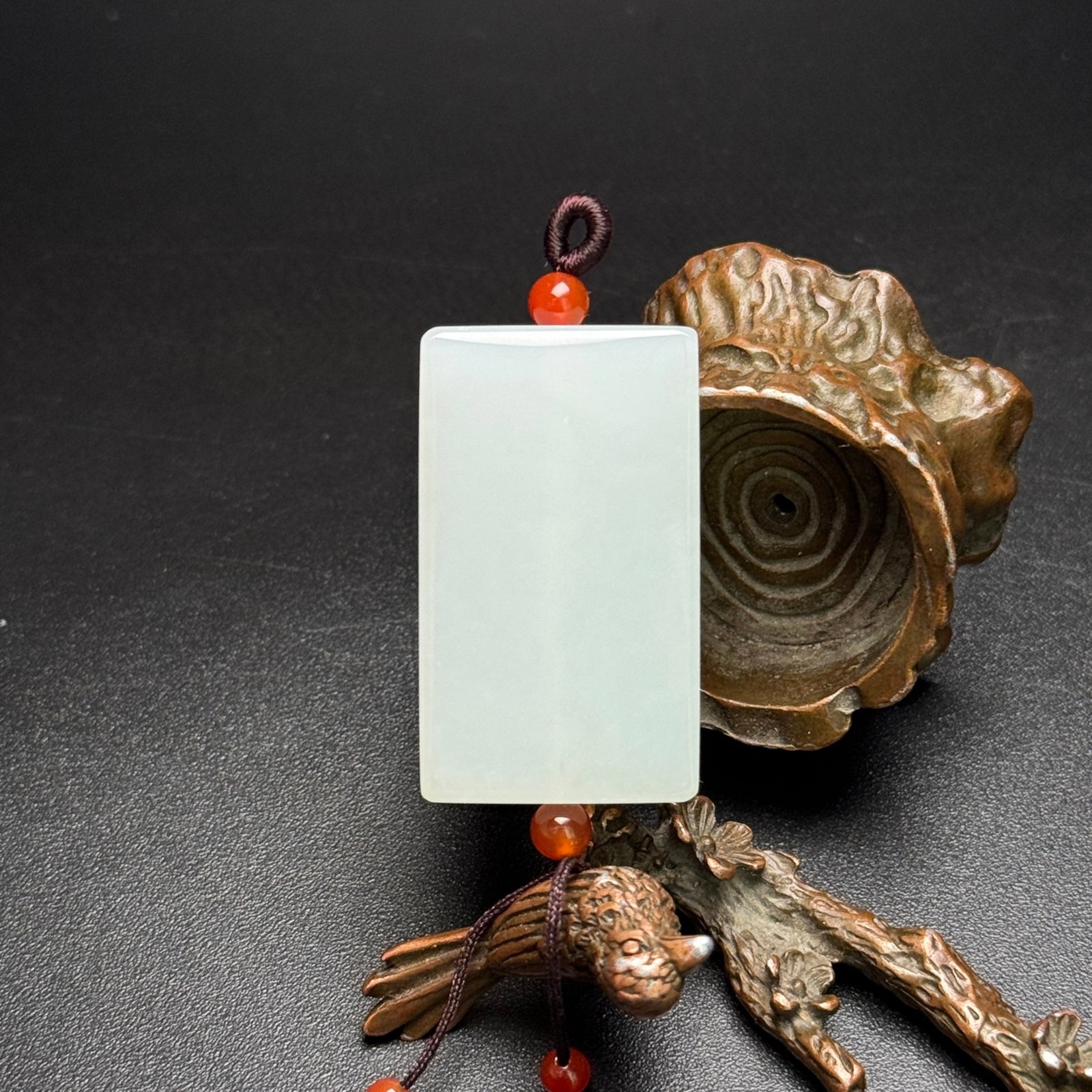 An Exquisite White Jade Pendant: An Exquisite White Jade Pendant,Qing Dynasty,China,Size:1.6inx0.9inx0.3in,Weight:23g 白玉牌,中国清代
