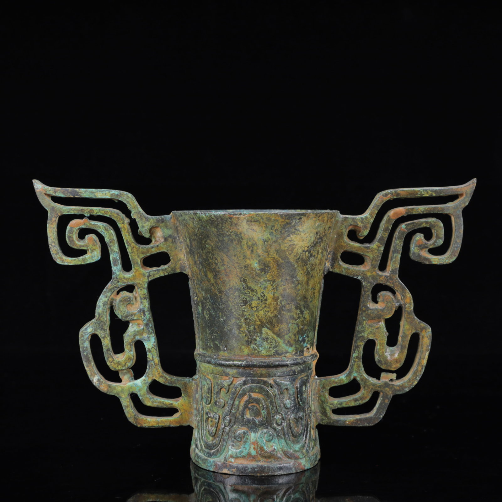 An Archaic Bronze Double-Ears Cup: An Archaic Bronze Double-Ears Cup,the Warring States Period in China,Size:8.7inx3.1inx5.5in,Weight:1050g 青铜双耳杯,中国战国时期