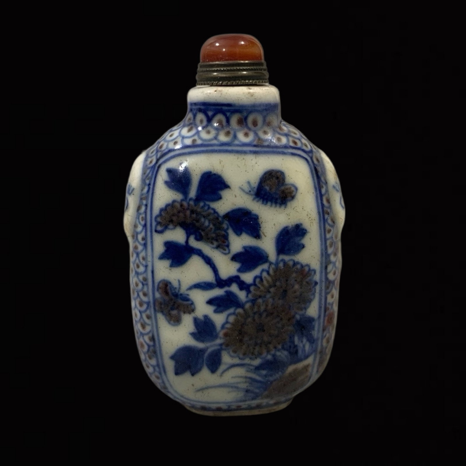 An Exquisite Blue and White Underglaze-Red Flower Pattern Snuff Bottle (1 of 9)