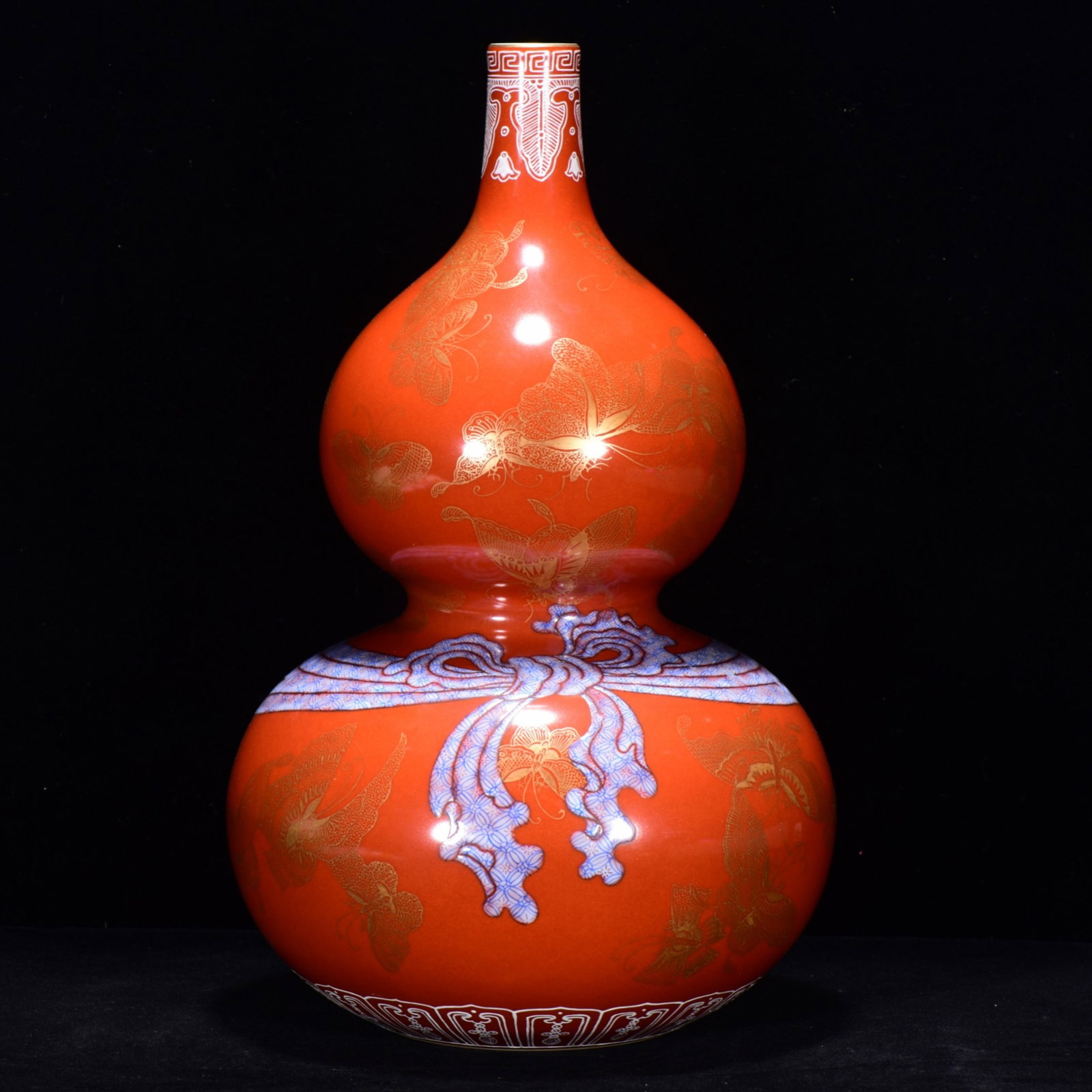 A Rare Red Glazed Painted Gold Butterfly Pattern Gourd-Shaped Vase: A Rare Red Glazed Painted Gold Butterfly Pattern Gourd-Shaped Vase,Qing Dynasty,China,Qianlong Six-Character Mark,Size:13inx7.5in 红釉描金蝴蝶纹葫ഐ