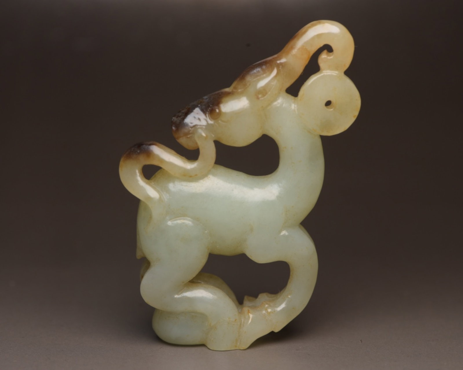 An Exquisite White Jade Deer Ornament: An Exquisite White Jade Deer Ornament,Qing Dynasty,China,Size:2.5inx1.9inx0.7in,Weight:43g 白玉鹿摆件,中国清代