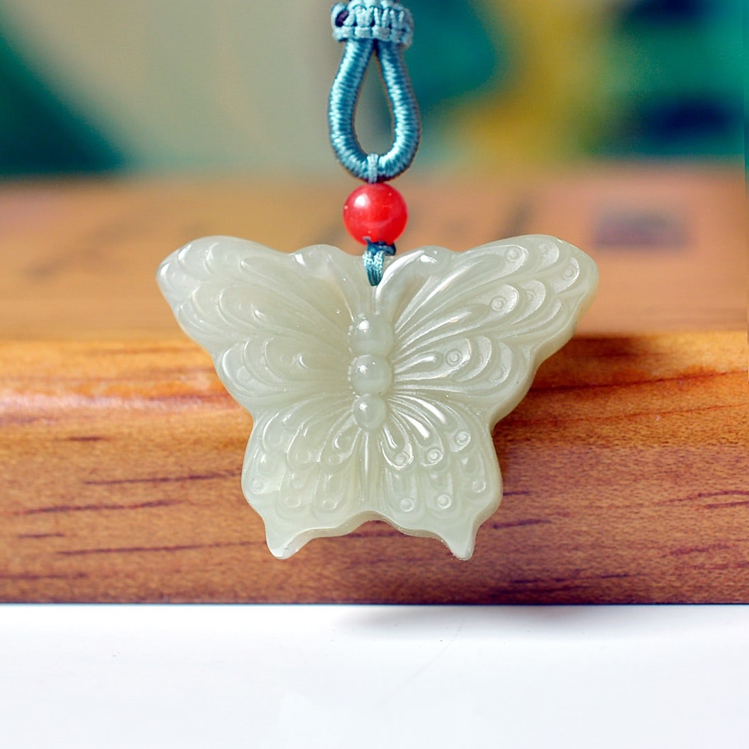 An Exquisite White Jade Butterfly Pendant: An Exquisite White Jade Butterfly Pendant,Size:0.9inx1.3in 白玉蝴蝶挂件