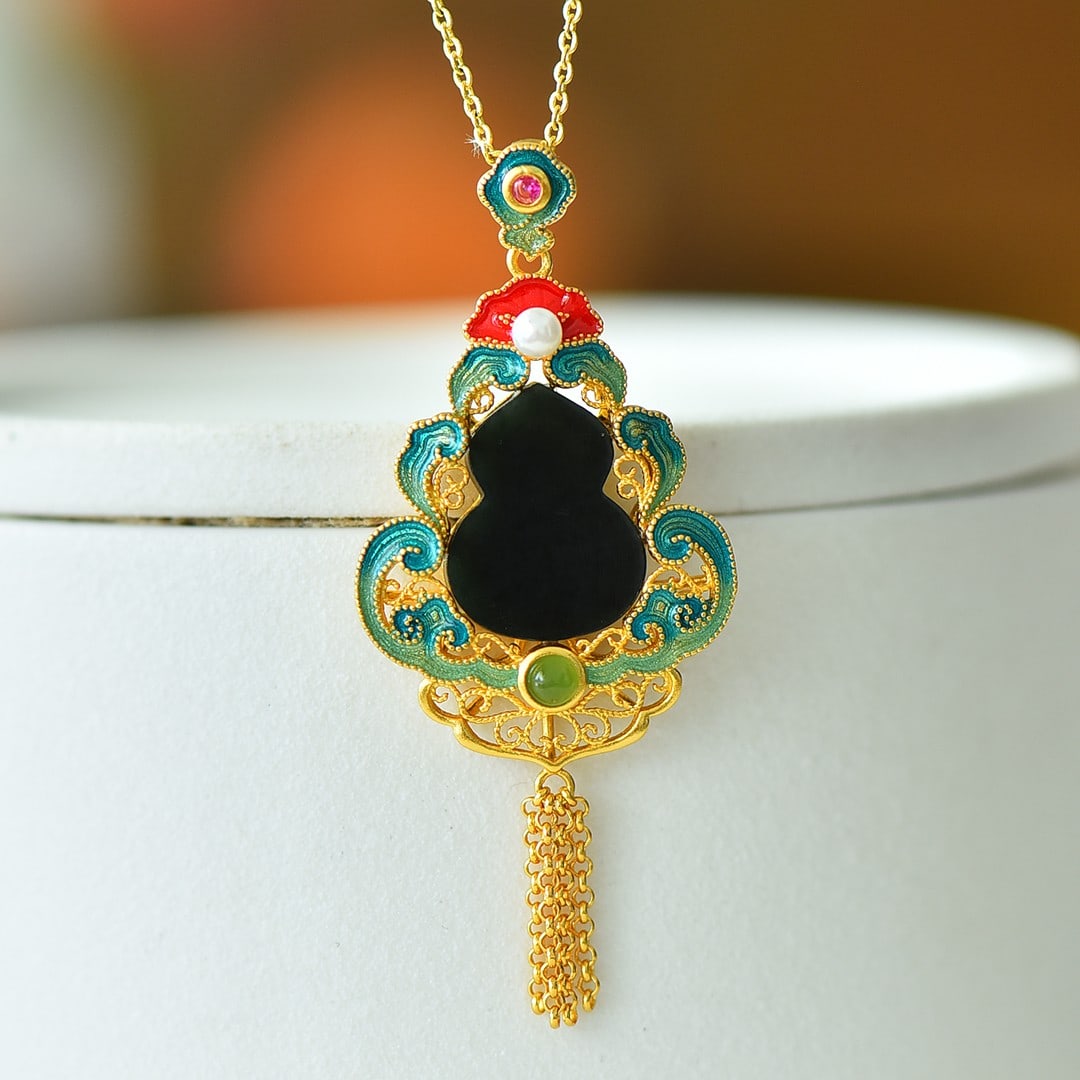 An Exquisite Sterling Silver-Gold Plated Inlaid Black Jade Enamel Pendant: An Exquisite Sterling Silver-Gold Plated Inlaid Black Jade Enamel Pendant 纯银镀金镶黑玉珐琅吊坠