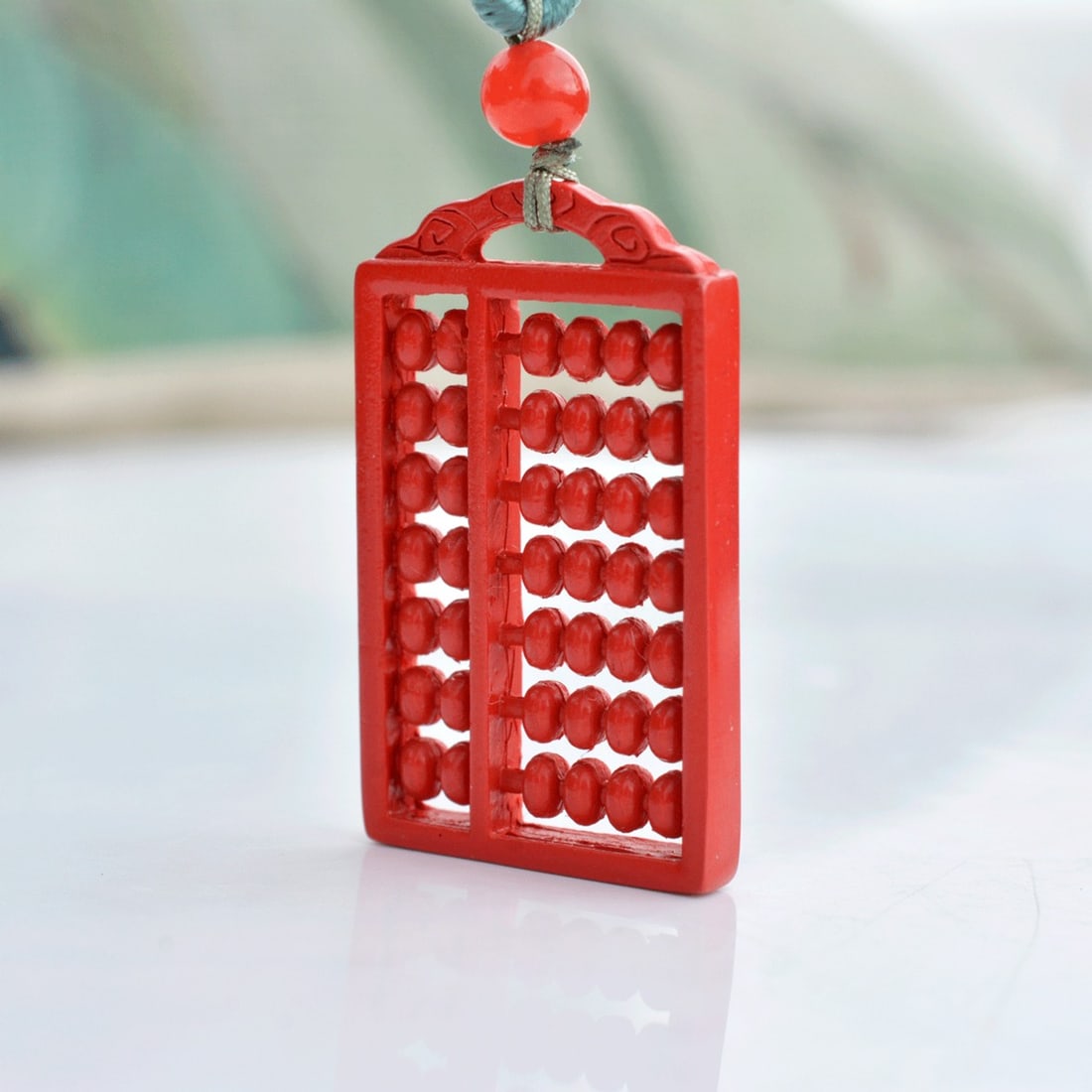 An Exquisite Cinnabar Abacus Pendant: An Exquisite Cinnabar Abacus Pendant,Size:0.7inx1.3in