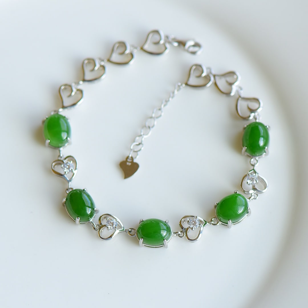 An Exquisite Sterling Silver Inlaid Jasper Bracelet,Inlaid Diamond: An Exquisite Sterling Silver Inlaid Jasper Bracelet,Inlaid Diamond,Size:0.3inx0.4in 纯银镶碧玉手链,嵌钻石