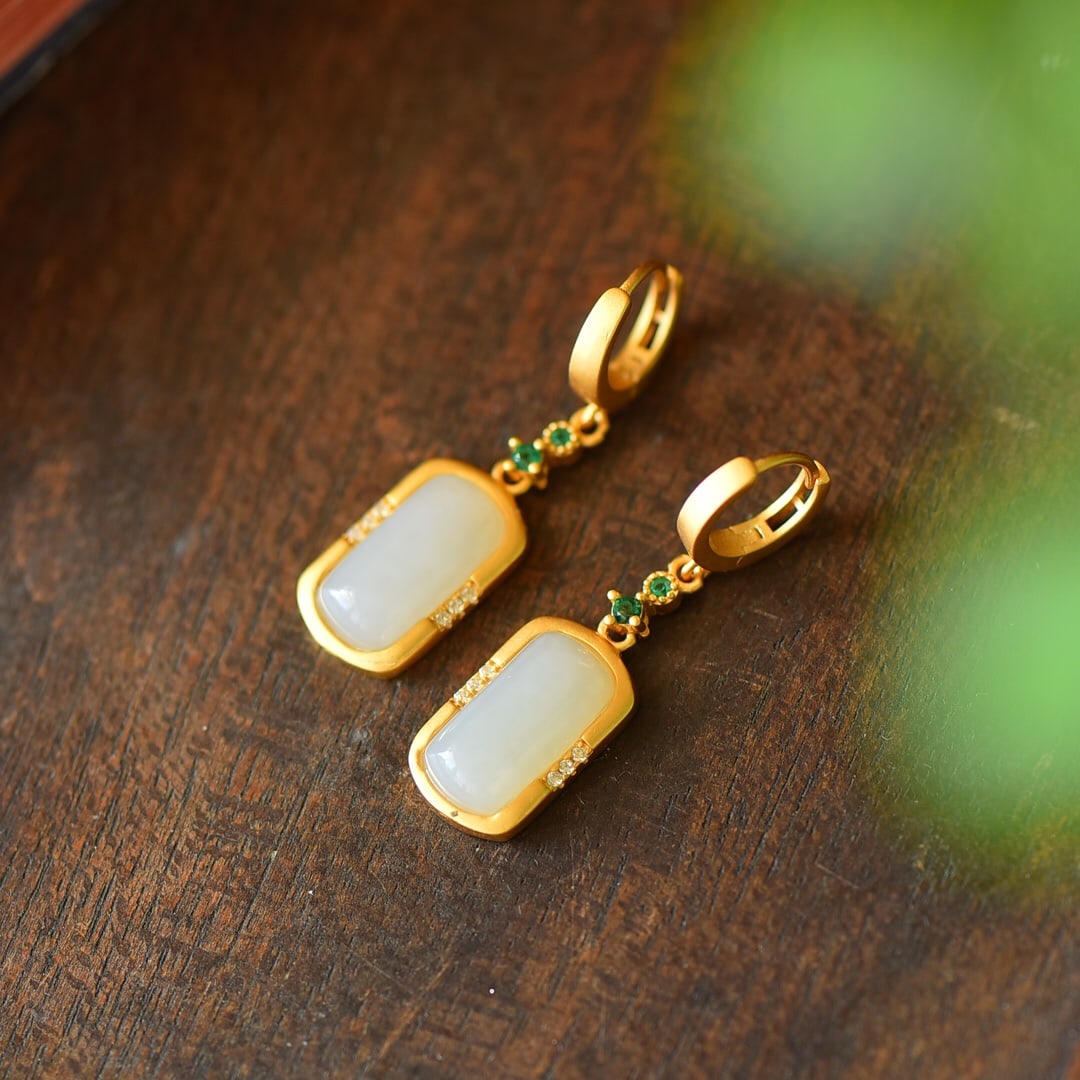 A Pair of Exquisite Sterling Silver-Gold Plated Inlaid White Jade Earrings: A Pair of Exquisite Sterling Silver-Gold Plated Inlaid White Jade Earrings,Size:0.4inx1.3in 一对纯银镀金镶白玉耳环