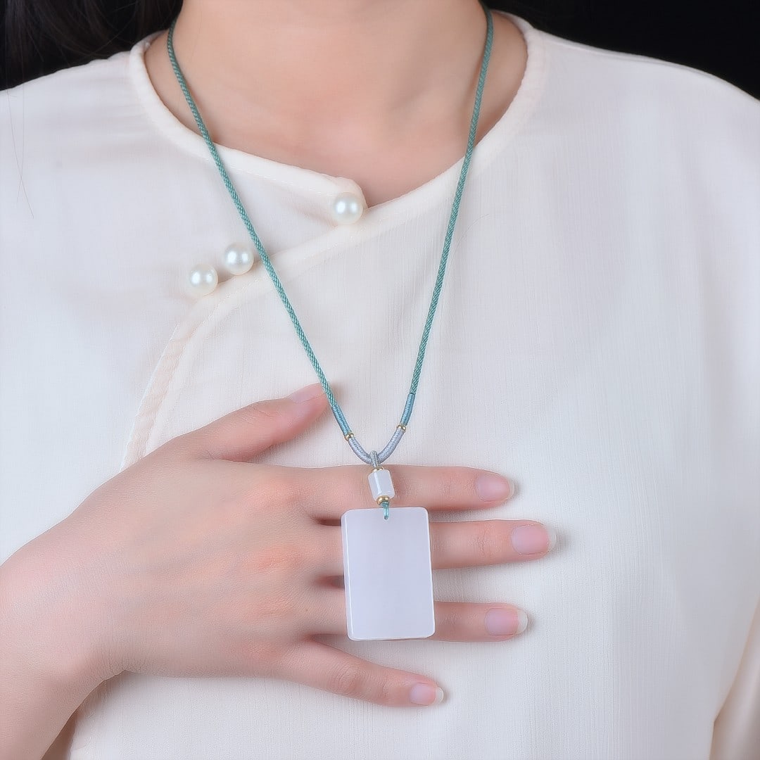 An Exquisite White Jade Pendant: An Exquisite White Jade Pendant,Size:1.2inx1.8in 白玉挂件