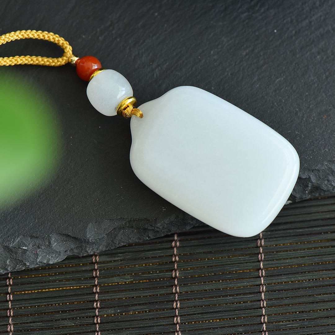 An Exquisite White Jade Pendant: An Exquisite White Jade Pendant,Size:1.7inx1.1in 白玉挂件
