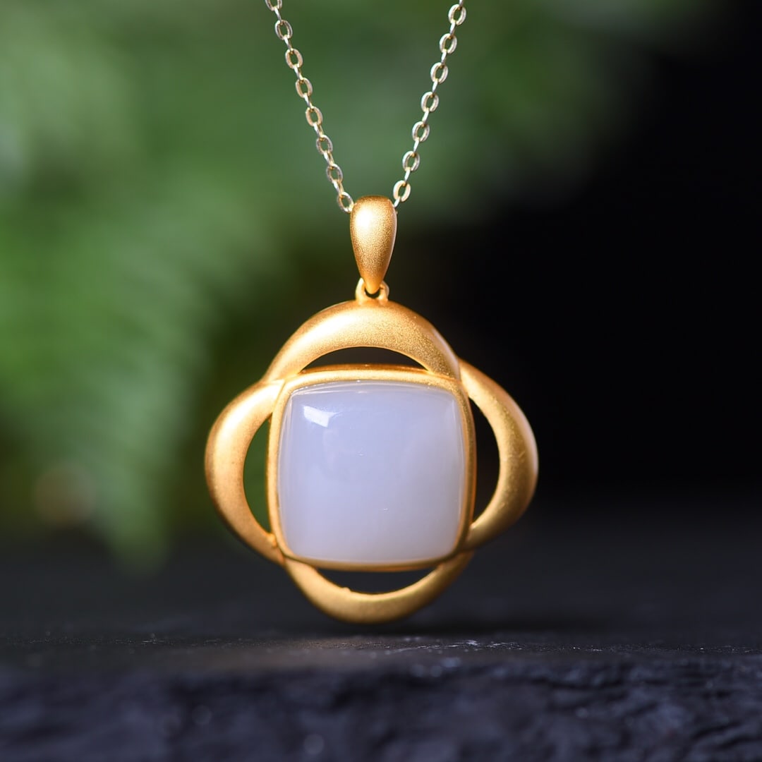 An Exquisite Sterling Silver-Gold Plated Inlaid White Jade Pendant: An Exquisite Sterling Silver-Gold Plated Inlaid White Jade Pendant,Size:0.6inx0.6in 纯银镀金镶白玉吊坠
