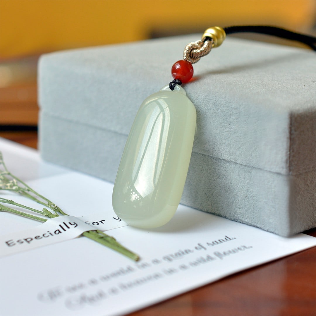 An Exquisite White Jade Pendant: An Exquisite White Jade Pendant,Size:0.7inx1.6in 白玉挂件