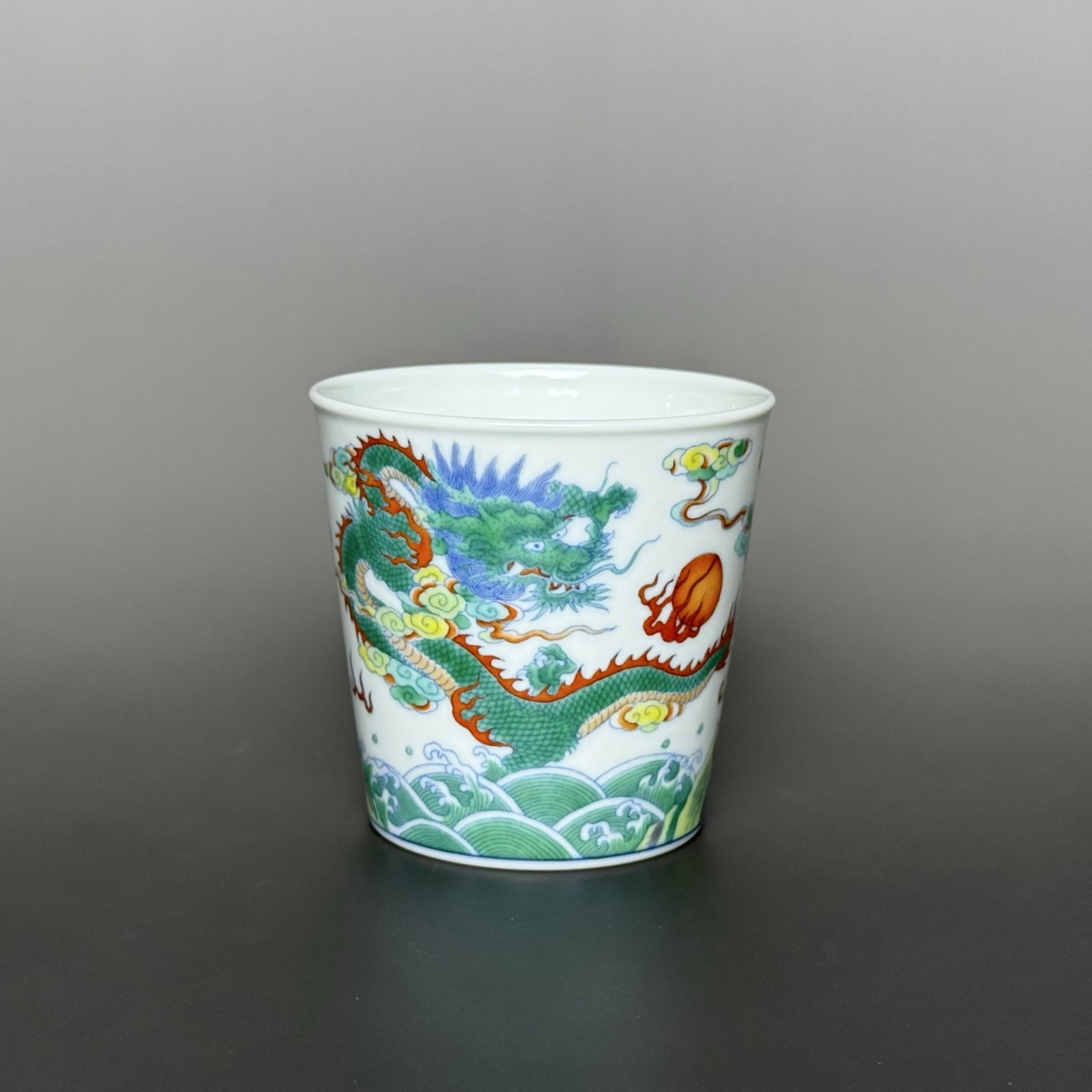 An Exquisite Famille-Rose Seawater Pattern Cup: An Exquisite Famille-Rose Seawater Pattern Cup,Qing Dynasty, China,Yongzheng Six-character Mark,Size:3.1inx3in