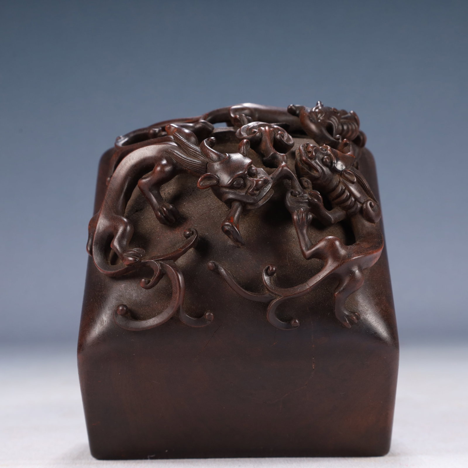 An Exquisite Zitanwood Chi-Dragon Pattern Seal: An Exquisite Zitanwood Chi-Dragon Pattern Seal,Qing Dynasty, China,Size:3.9inx7.7in,Weight:750g 紫檀木螭龙纹印章,中国清代