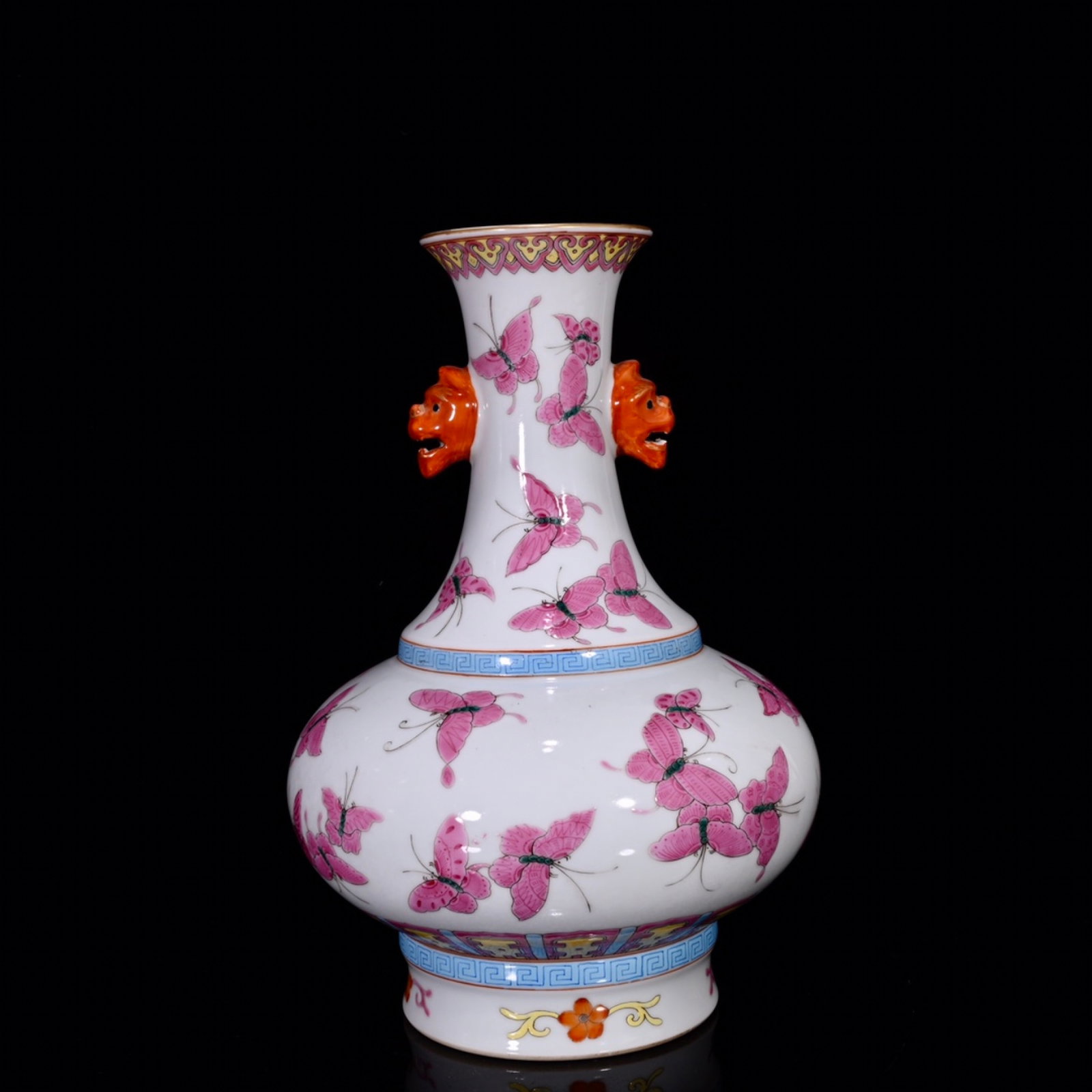 A Rare Ruby Red Glazed Butterfly Pattern Beast-Ears Vase: A Rare Ruby Red Glazed Butterfly Pattern Beast-Ears Vase,Qing Dynasty,China,Qianlong Six-Character Mark,Size:12.2inx8.3in 胭脂红釉蝴蝶纹兽耳ல