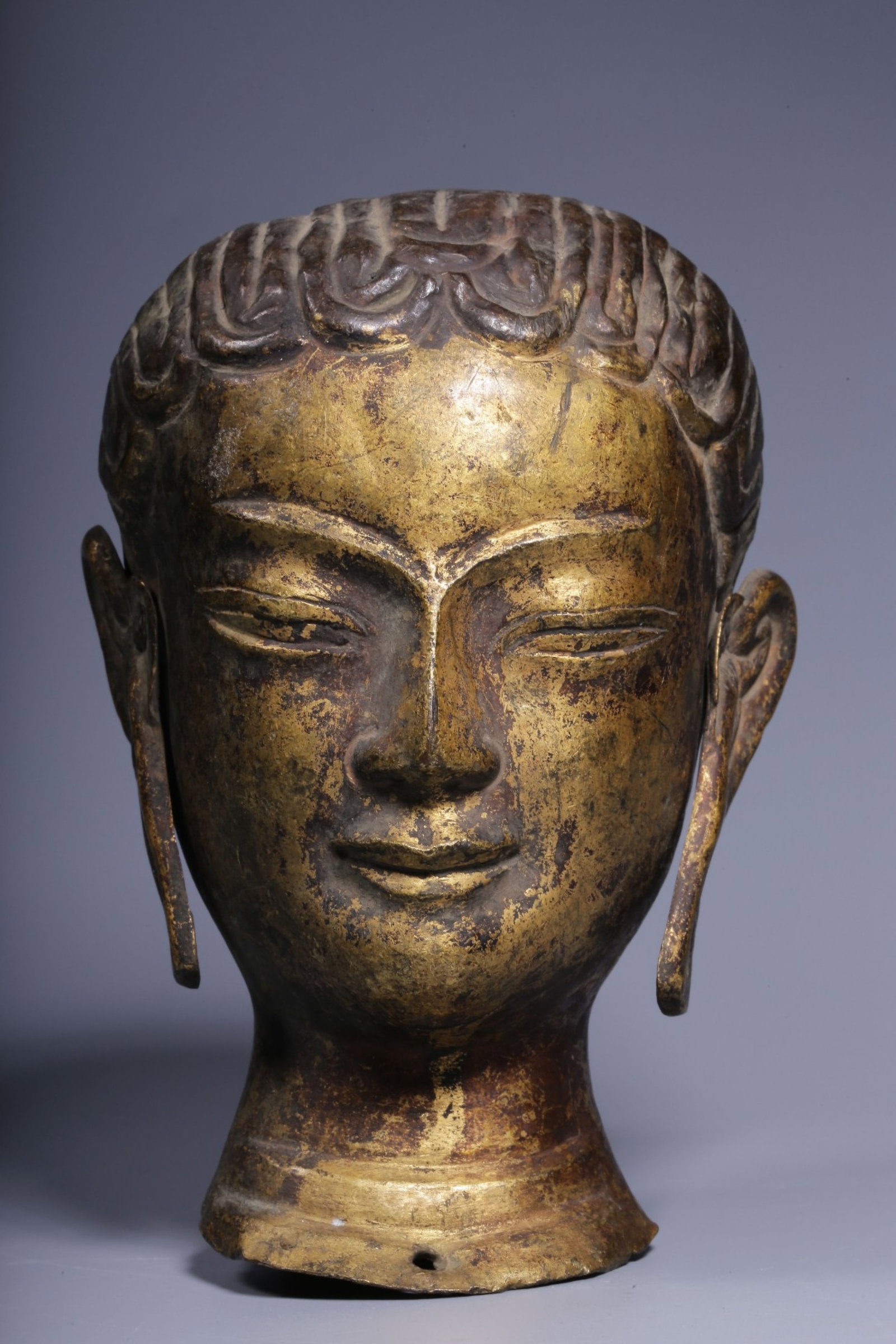 A Rare Gilt Bronze Guanyin's Head: A Rare Gilt Bronze Guanyin's Head,Qing Dynasty, China,Size:5.3inx3.7inx4.1in,Weight:340g 铜鎏金观音佛头,中国清代