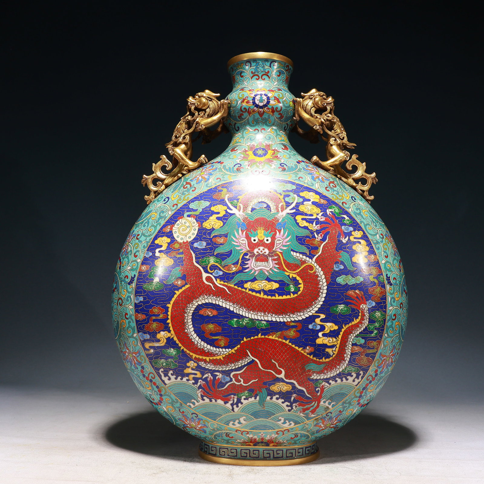 A Huge Cloisonne Lotus,Auspicious Cloud and Dragon Pattern Dragon-Ears Vase: A Huge Cloisonne Lotus,Auspicious Cloud and Dragon Pattern Dragon-Ears Vase,Qing Dynasty, China,Qianlong Six-character Mark,Size:13inx6.3inx18.5in,Weight:10300g 景泰蓝缠枝