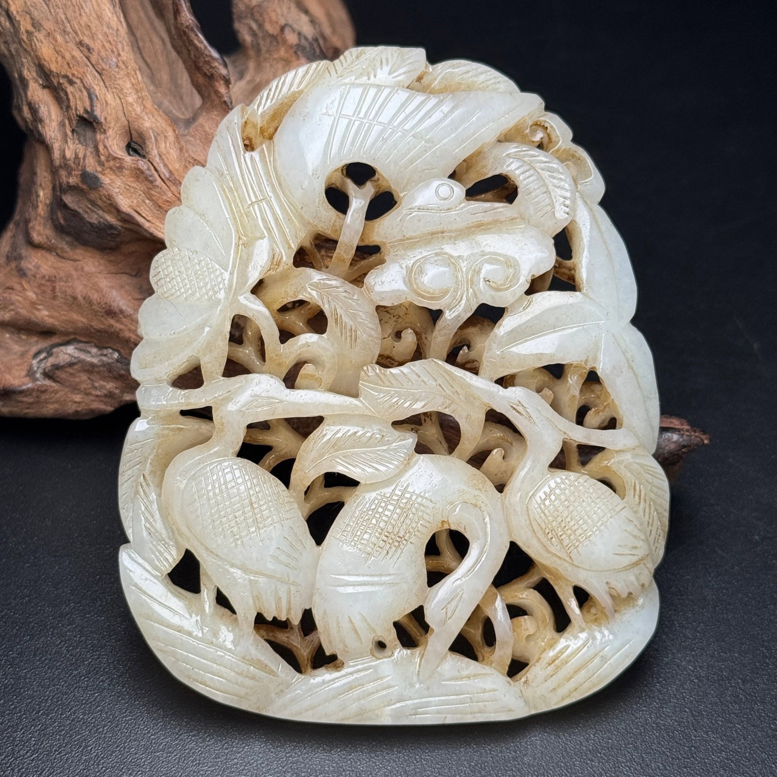 An Exquisite White Jade Crane Pattern Ornament: An Exquisite White Jade Crane Pattern Ornament,Liao Dynasty,China,Size:95mmx77mmx10mm,Weight:111g 白玉鹤纹摆件,中国辽代