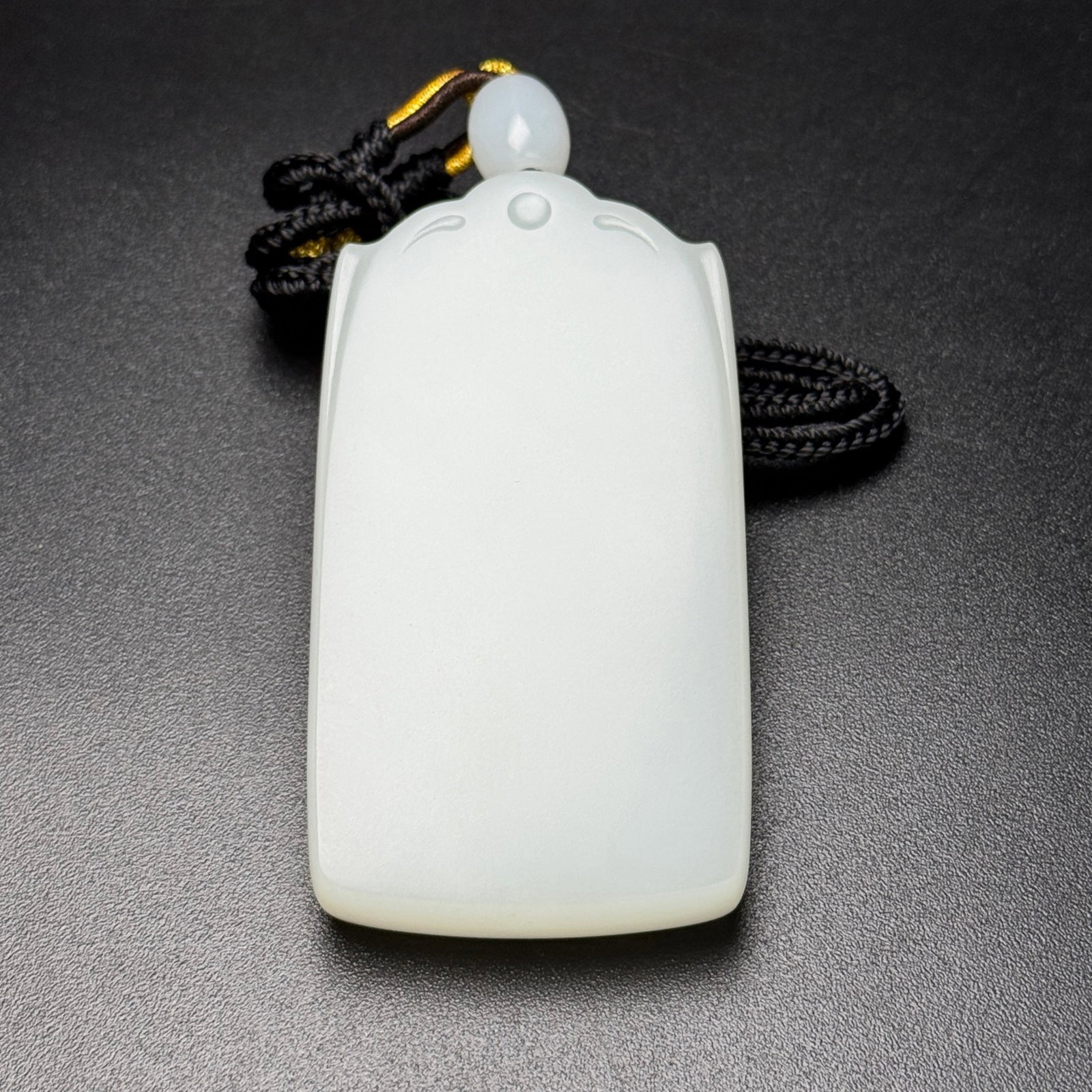 An Exquisite White Jade Pendant: An Exquisite White Jade Pendant,Qing Dynasty,China,Size:79mmx42mmx12mm,Weight:108g 白玉牌,中国清代