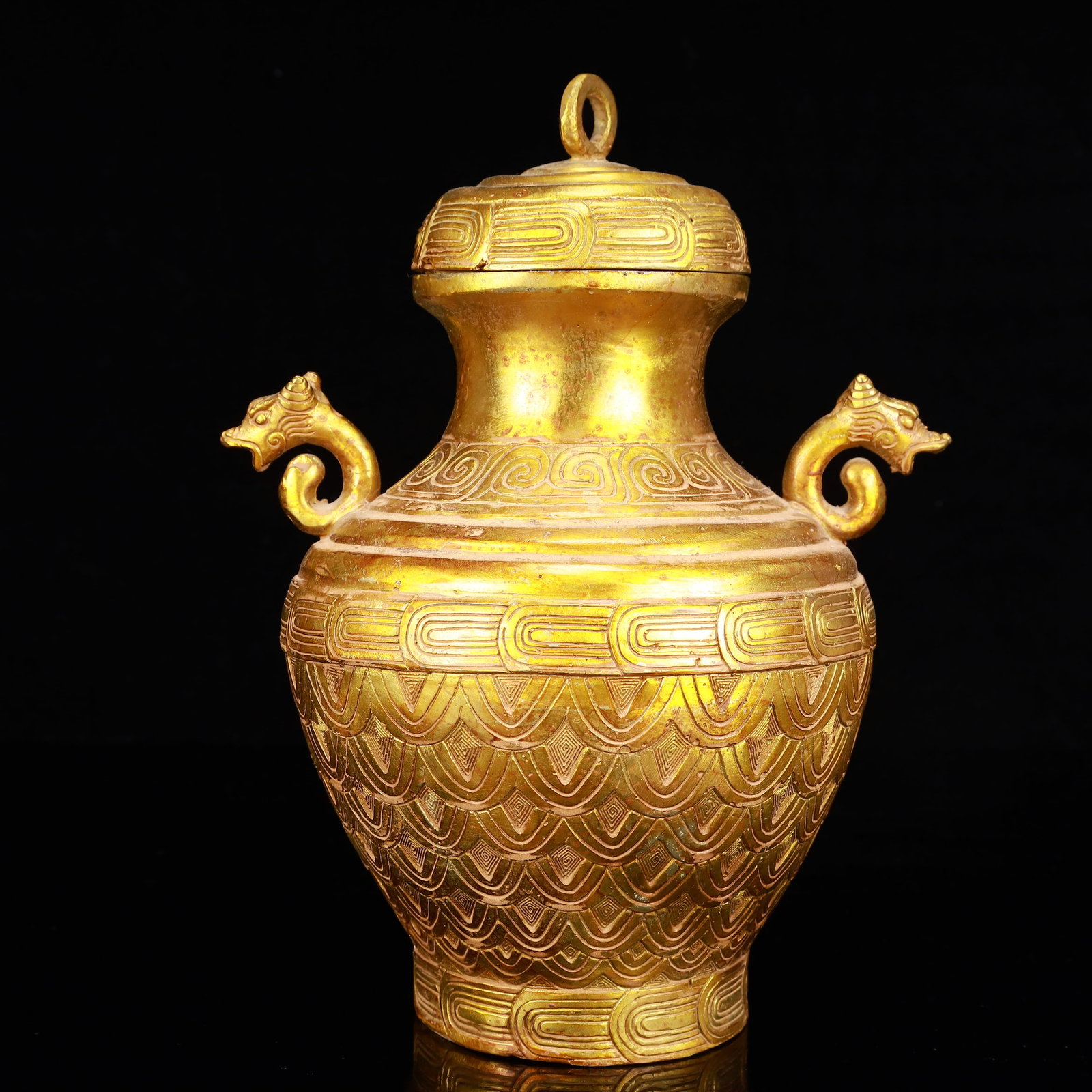 A Rare Gilt Bronze Dragon Pattern Double-Ears Vase: A Rare Gilt Bronze Dragon Pattern Double-Ears Vase,The Warring States period in China,Size:7.5inx6.3inx10.2in,Weight:1800g 铜鎏金龙纹双耳瓶,中