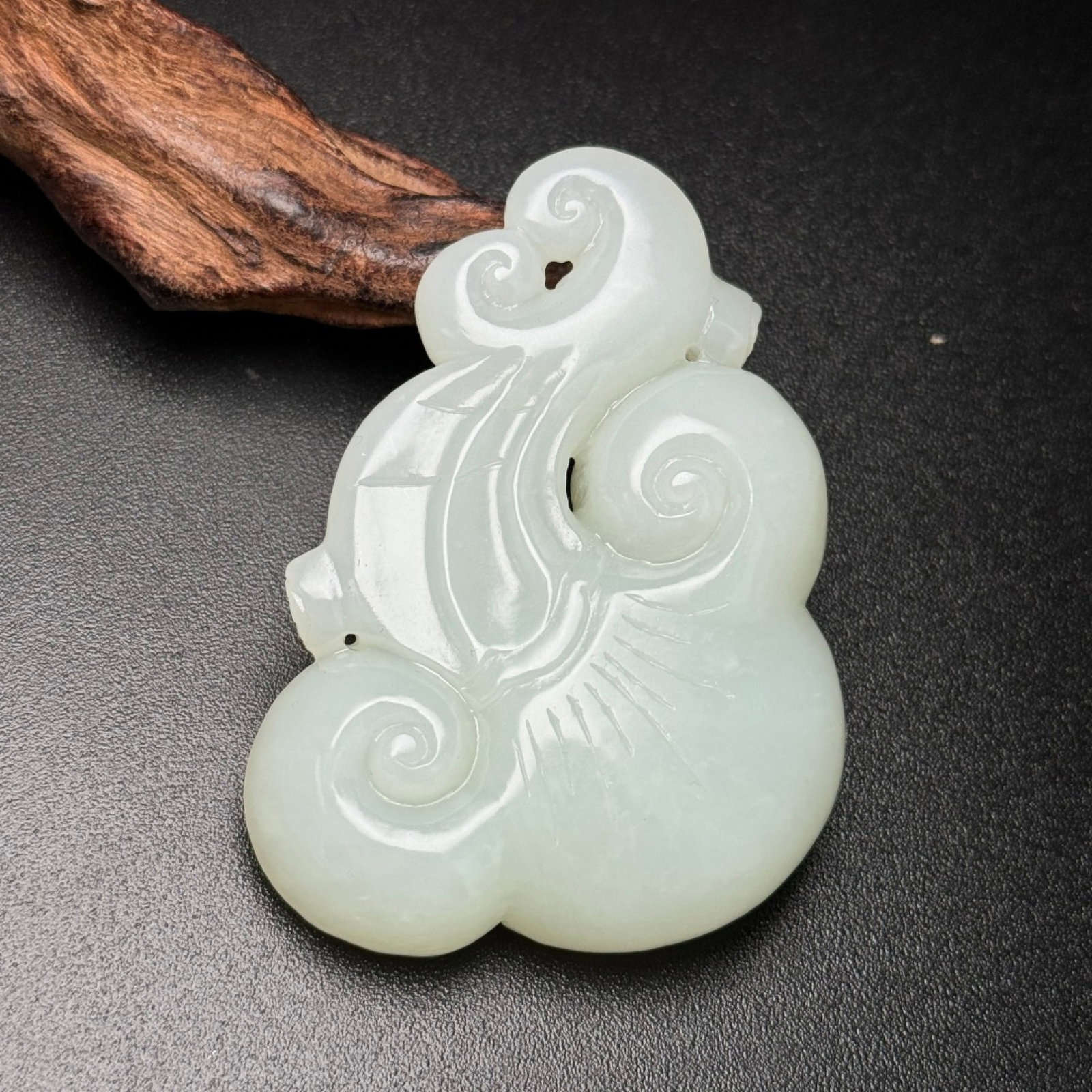 An Exquisite White Jade Ornament: An Exquisite White Jade Ornament,Qing Dynasty,China,Size:68mmx48mmx19mm,Weight:69g 白玉摆件,中国清代