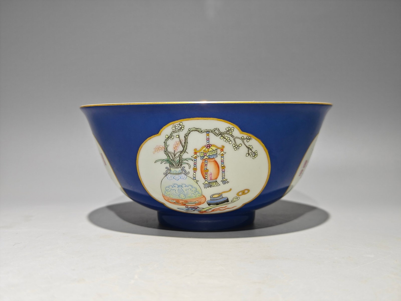 An Exquisite Enamel Blue Ground Flower Pattern Bowl,with poem: An Exquisite Enamel Blue Ground Flower Pattern Bowl,with poem,Qing Dynasty,China,Qianlong Mark,Size:2.8inx6in 珐琅彩蓝地花卉纹碗,带诗&
