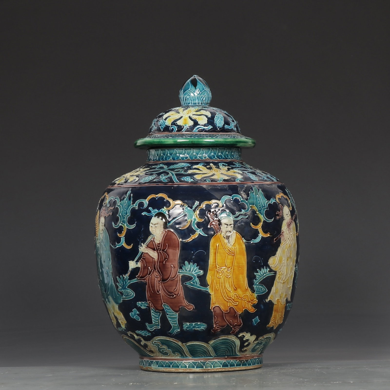 An Exquisite Fahua Ware Figure Pattern Jar with Cover: An Exquisite Fahua Ware Figure Pattern Jar with Cover,Ming Dynasty,China,Zhengde Four-Character Mark,Size:10.6inx7.5in 珐华彩人物纹盖罐,中国
