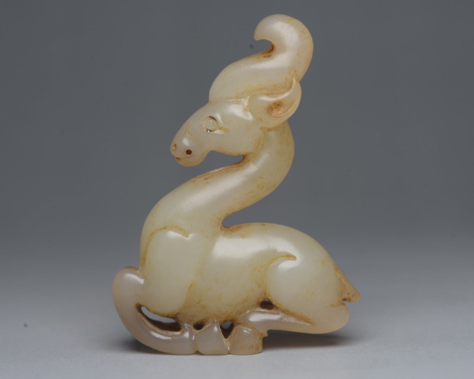 An Exquisite White Jade Deer Ornament: An Exquisite White Jade Deer Ornament,Qing Dynasty,China,Size:2.5inx1.9inx0.6in,Weight:43g 白玉鹿摆件,中国清代