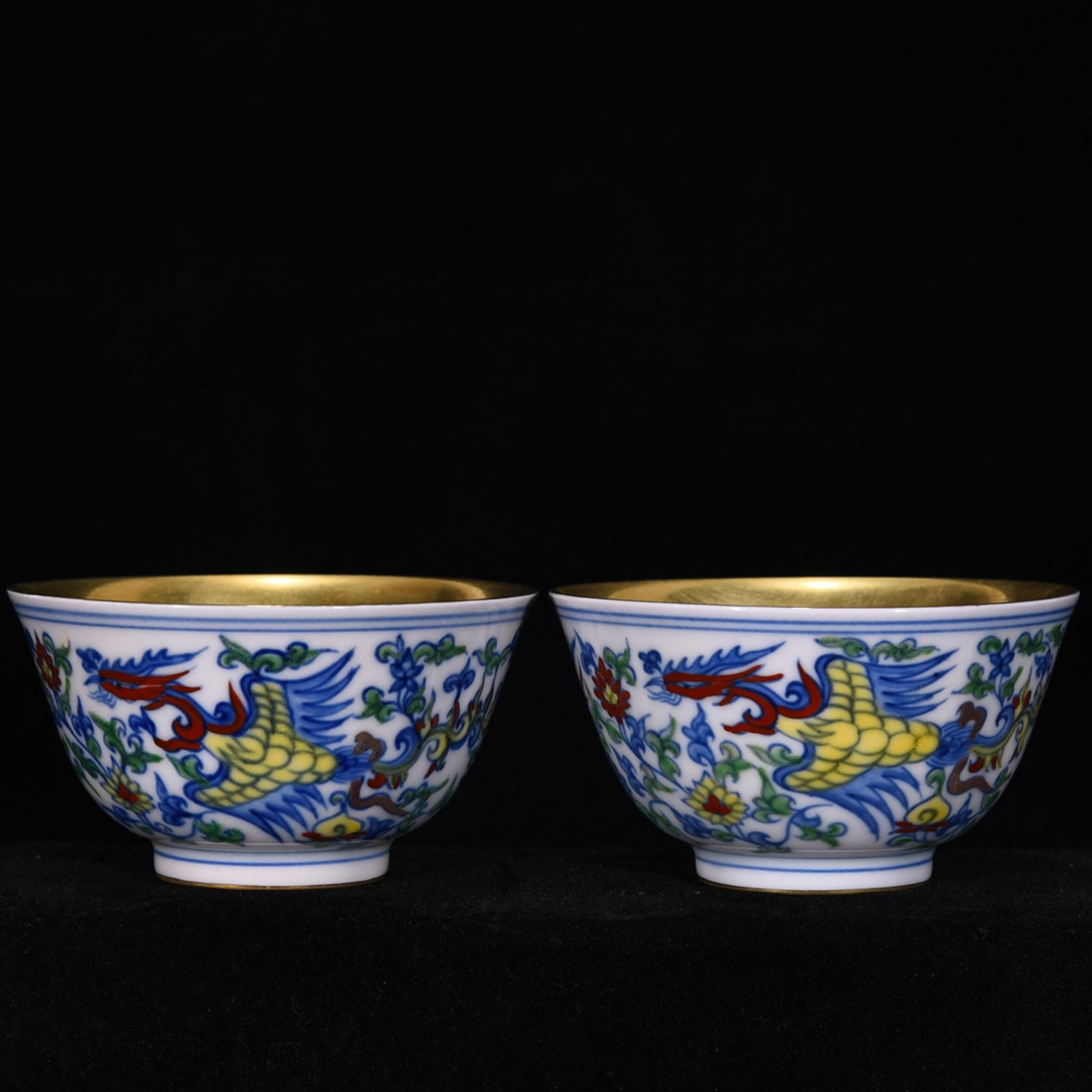 A Pair of Exquisite Doucai Gilt Phoenix Pattern Cup: A Pair of Exquisite Doucai Gilt Phoenix Pattern Cup,Ming Dynasty,China,Chenghua Six-character Mark,Size:2.2inx3.3in