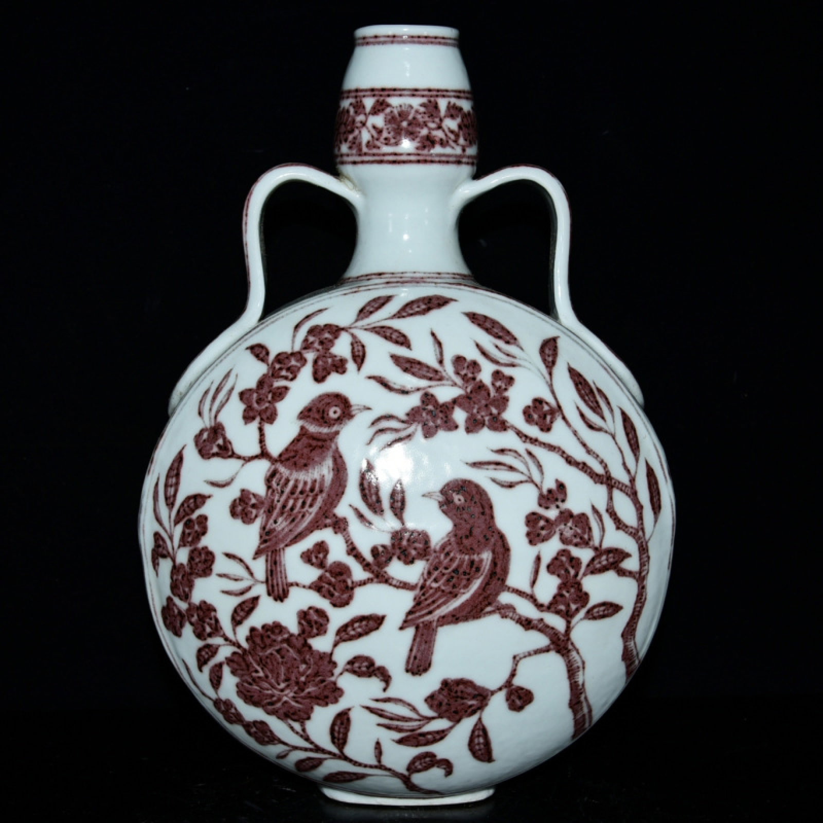 An Exquisite Underglaze-Red Flower and Bird Pattern Double-Ears Vase: An Exquisite Underglaze-Red Flower and Bird Pattern Double-Ears Vase,Ming Dynasty,China,Xuande Six-character Mark,Size:11inx7.5in 釉里红花鸟纹双耳ல