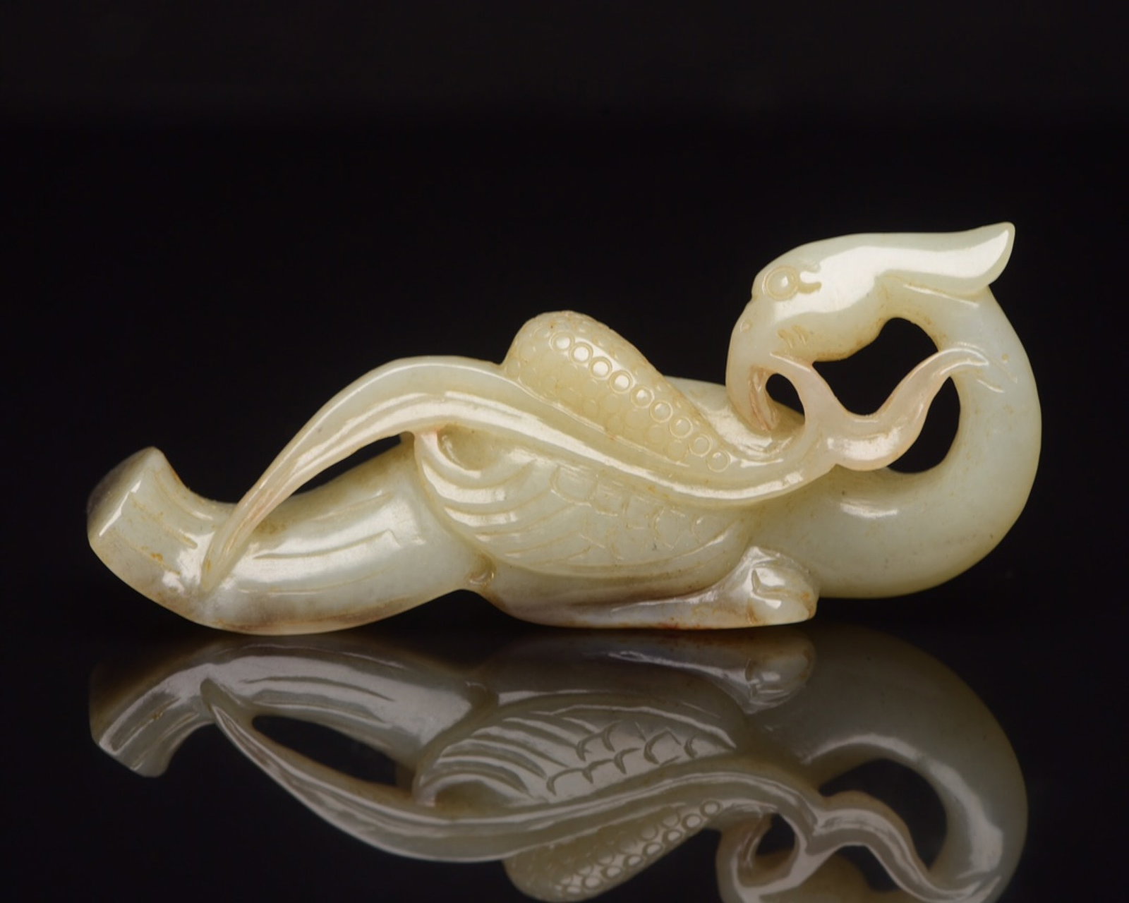 An Exquisite White Jade Phoenix Ornament: An Exquisite White Jade Phoenix Ornament,Qing Dynasty,China,Size:3.3inx1.3inx0.8in,Weight:51g 白玉凤摆件,中国清代