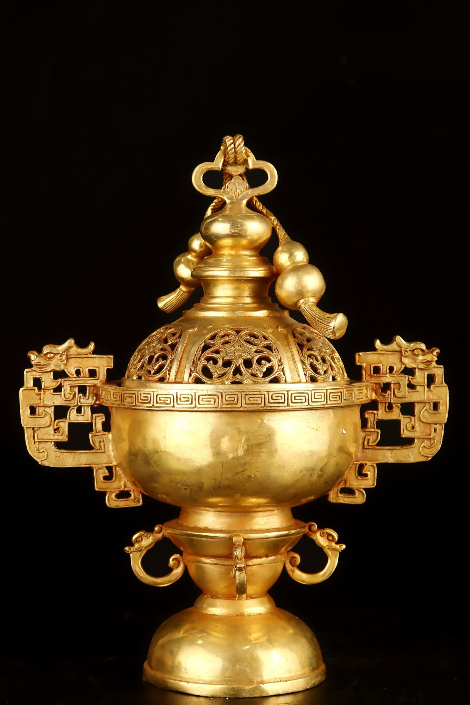 An Exquisite Gilt Bronze Double-Ears Censer: An Exquisite Gilt Bronze Double-Ears Censer,Qing Dynasty, China,Size:8.7inx11.4in Weight:1861g 铜鎏金双耳香炉,中国清代