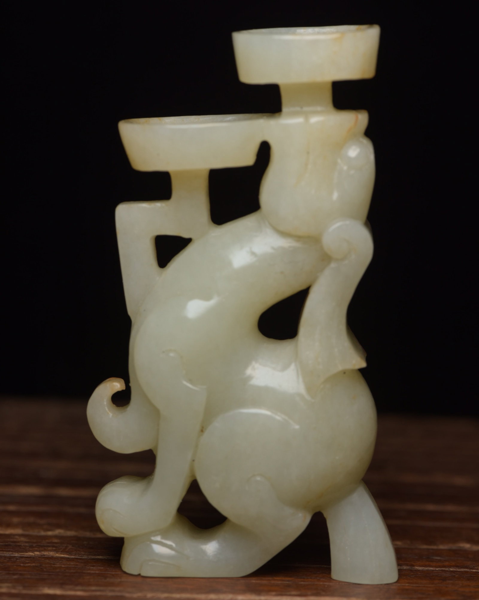 An Exquisite White Jade Beast Candlestick: An Exquisite White Jade Beast Candlestick,Qing Dynasty,China,Size:3.6inx2inx0.8in,Weight:126g 白玉兽烛台,中国清代