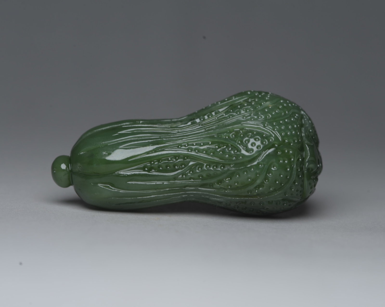 An Exquisite Jasper Cabbage Ornament: An Exquisite Jasper Cabbage Ornament,Qing Dynasty,China,Size:2.4inx1.2inx1in,Weight:60g 碧玉白菜摆件,中国清代