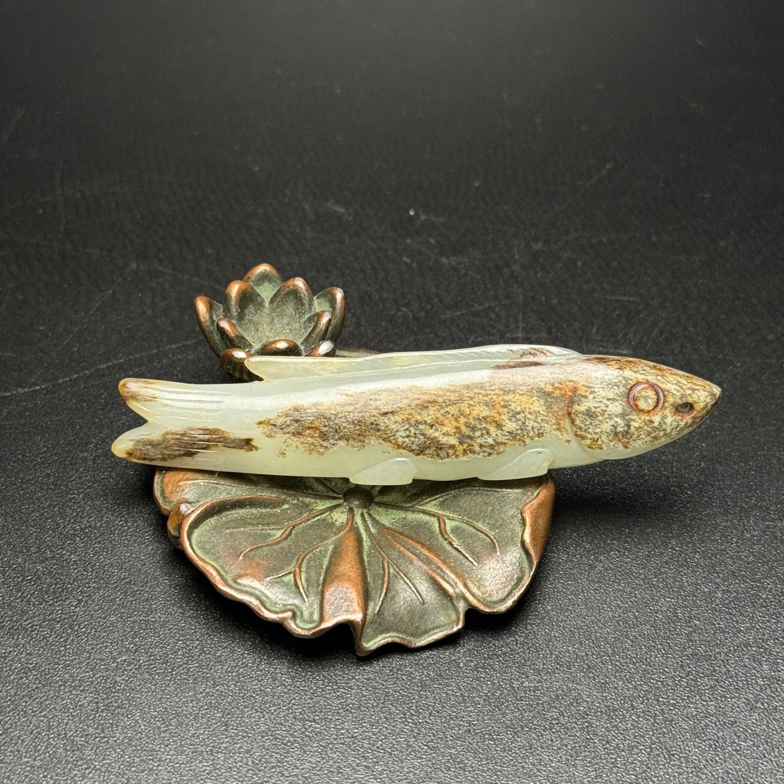 An Exquisite White Jade Fish Ornament: An Exquisite White Jade Fish Ornament,Qing Dynasty,China,Size:74mmx16mmx9mm,Weight:15g 白玉鱼摆件,中国清代