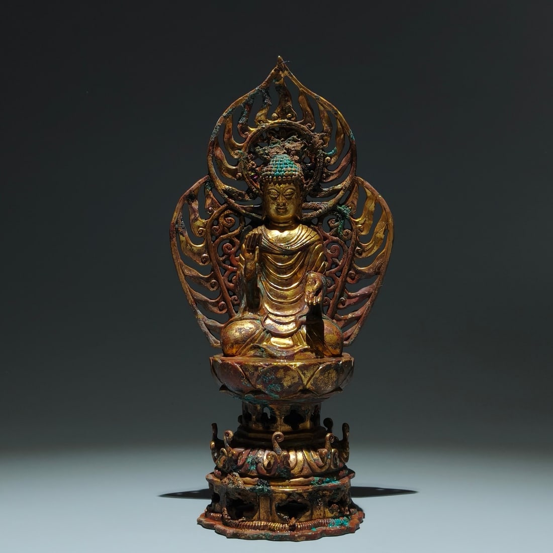 A Solemn Gilt Bronze Statue of Sakyamuni: A Solemn Gilt Bronze Statue of Sakyamuni,Tang Dynasty,China,Size:10.6inx5.3inx3.7in 铜鎏金释迦摩尼像,中国唐代
