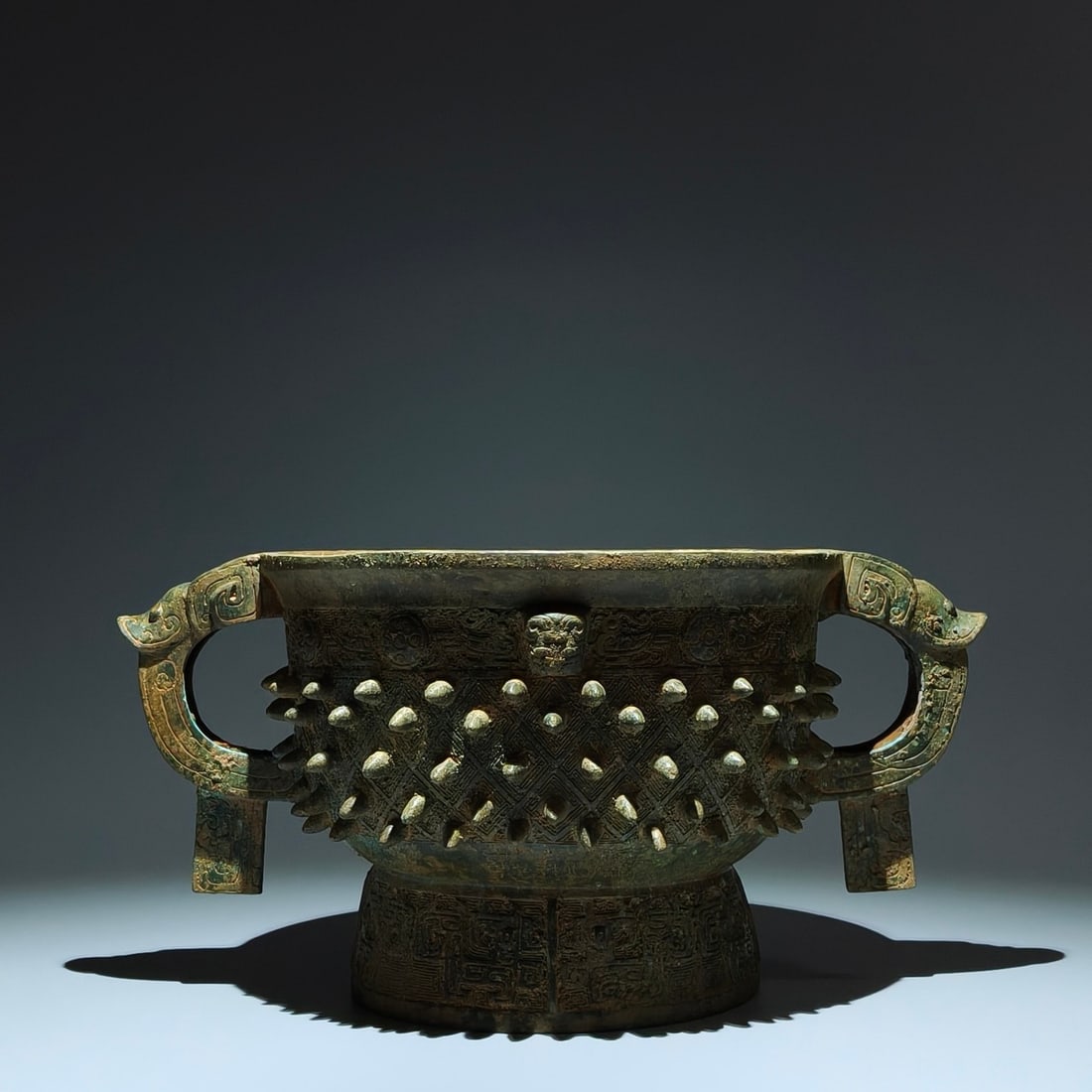 An Archaic Bronze Phoenix Pattern Double-Ears Censer,With Inscription: An Archaic Bronze Phoenix Pattern Double-Ears Censer,With Inscription,Western Zhou Dynasty,China,Size:7.5inx15inx10in 青铜凤纹双耳香炉,带铭&