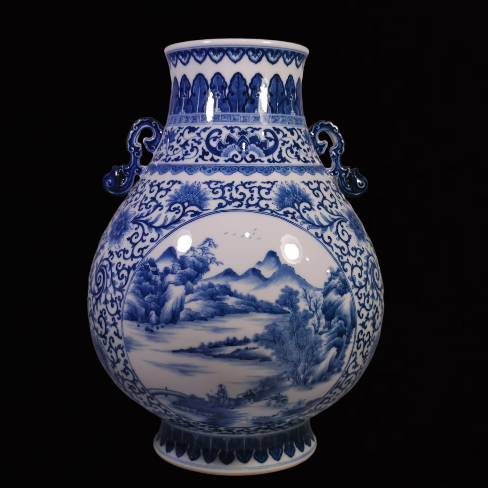 An Exquisite Blue and White Landscape and Figure Pattern Double-Ears Vase: An Exquisite Blue and White Landscape and Figure Pattern Double-Ears Vase ,Qing Dynasty, China, Qianlong Six-character Mark,Size:14.9inx5.1in 青花缠枝莲山水&#