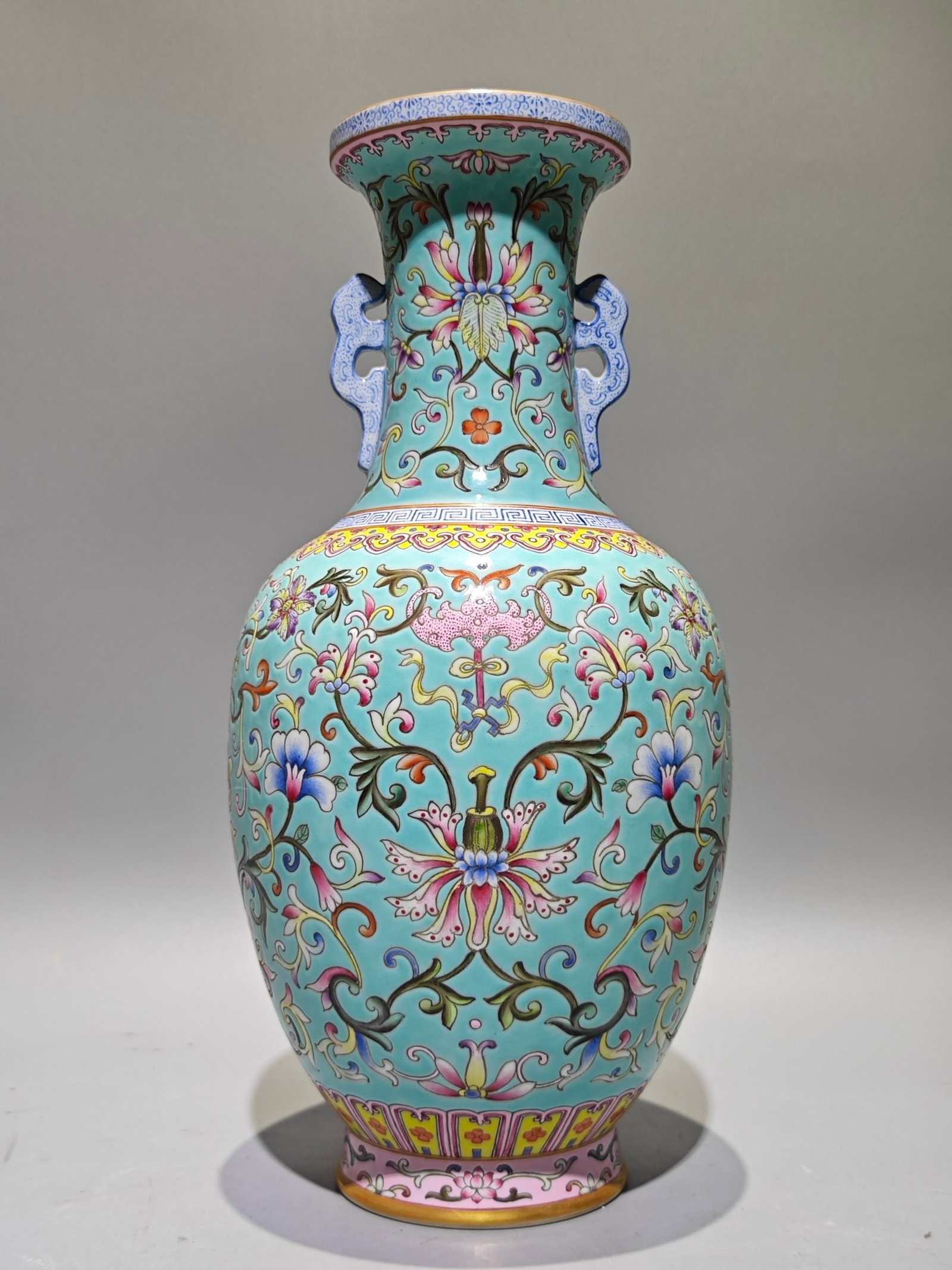 An Exquisite Turquoise Glazed Enamel Lotus Pattern Double-Ears Vase: An Exquisite Turquoise Glazed Enamel Lotus Pattern Double-Ears Vase,Qing Dynasty,China,Qianlong Six-character Mark,Size:13.2inx6.3in