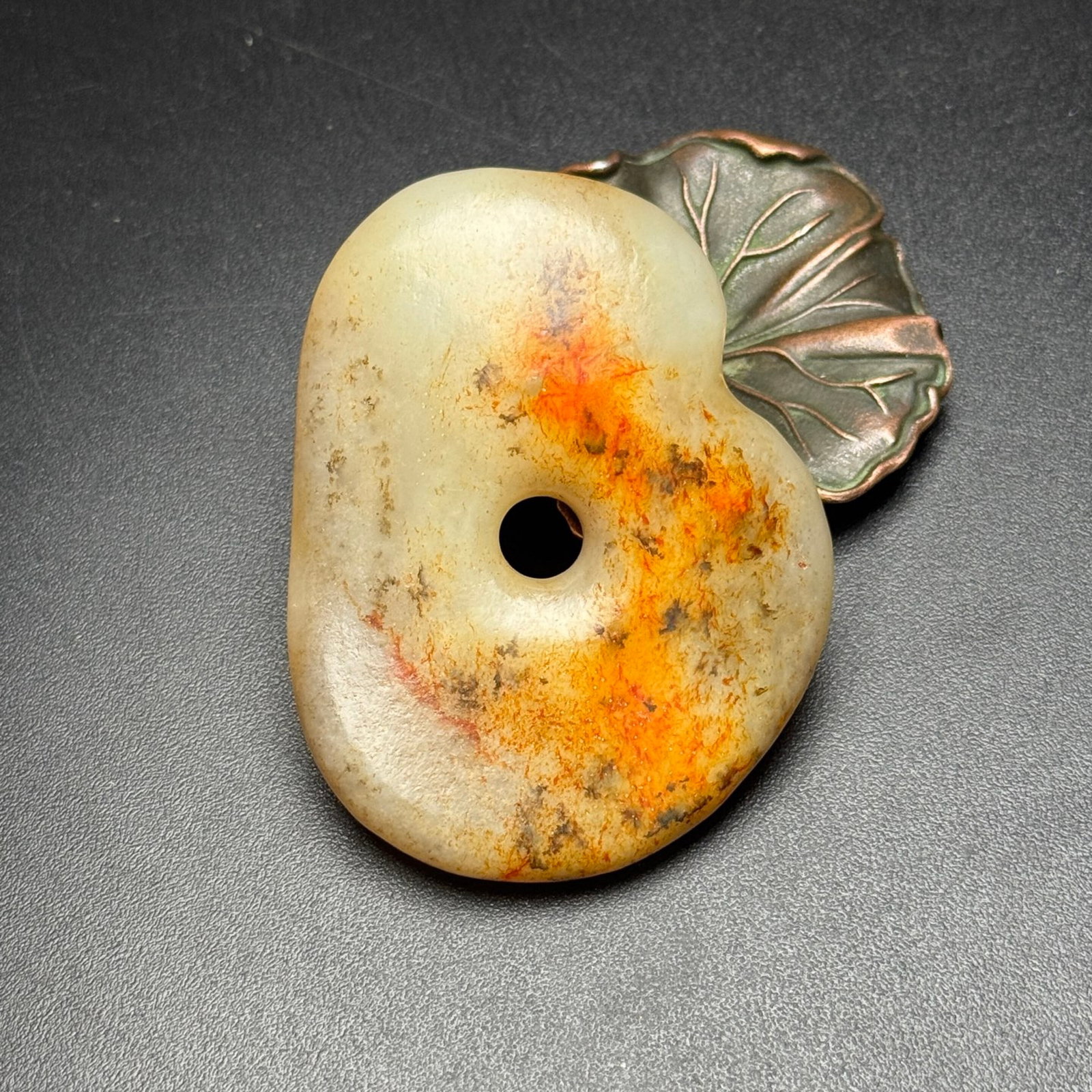 An Exquisite White Jade Pendant: An Exquisite White Jade Pendant,Qing Dynasty,China,Size:66mmx51mmx12mm,Weight:58g 白玉佩,中国清代