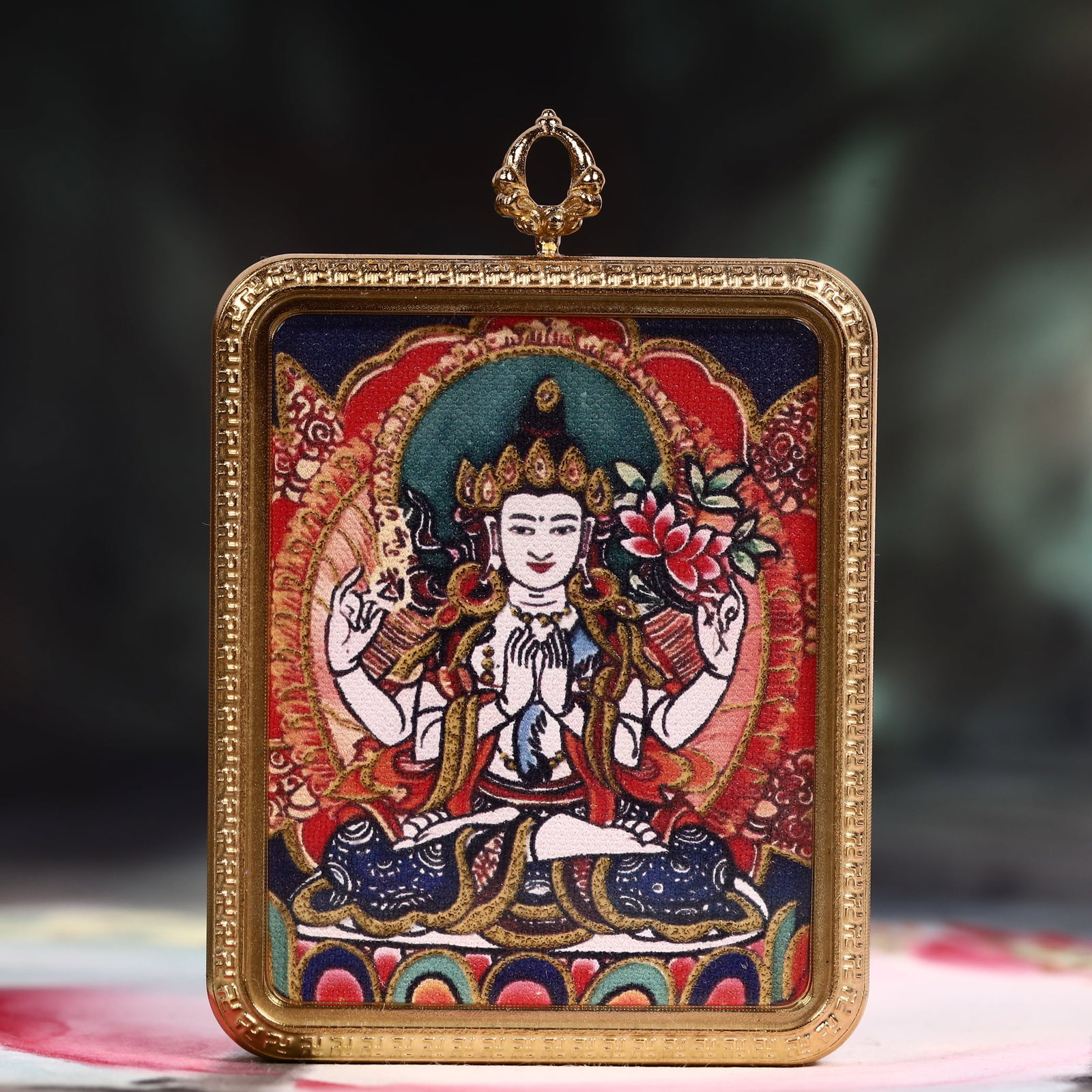 An Exquisite Painted Color Statue of Four-Armed Guanyin Tangka: An Exquisite Painted Color Statue of Four-Armed Guanyin Tangka,Size:2inx2.8in 彩绘四臂观音像唐卡