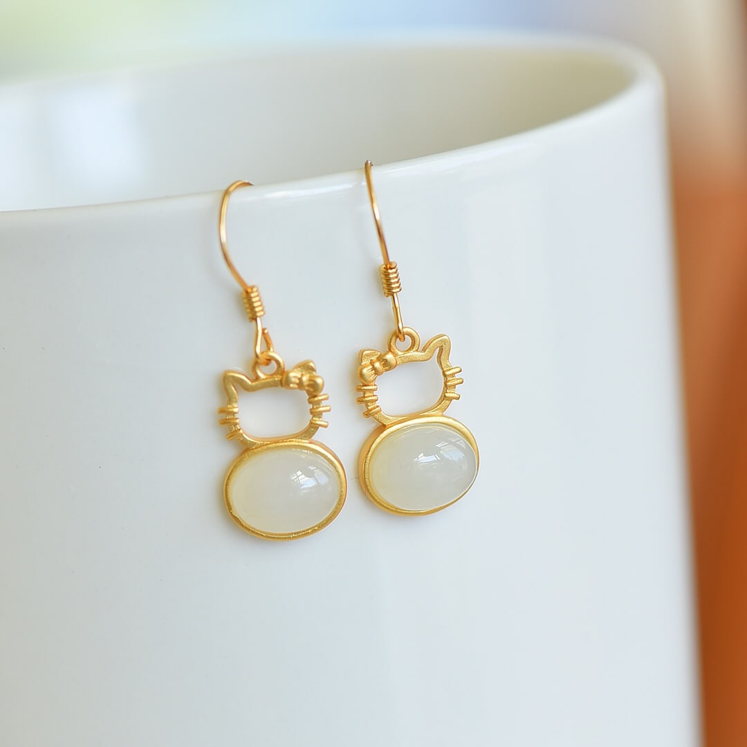 A Pair of Exquisite Sterling Silver-Gold Plated Inlaid White Jade Earrings: A Pair of Exquisite Sterling Silver-Gold Plated Inlaid White Jade Earrings,Size:7mmx9mm 一对纯银镀金镶白玉耳环