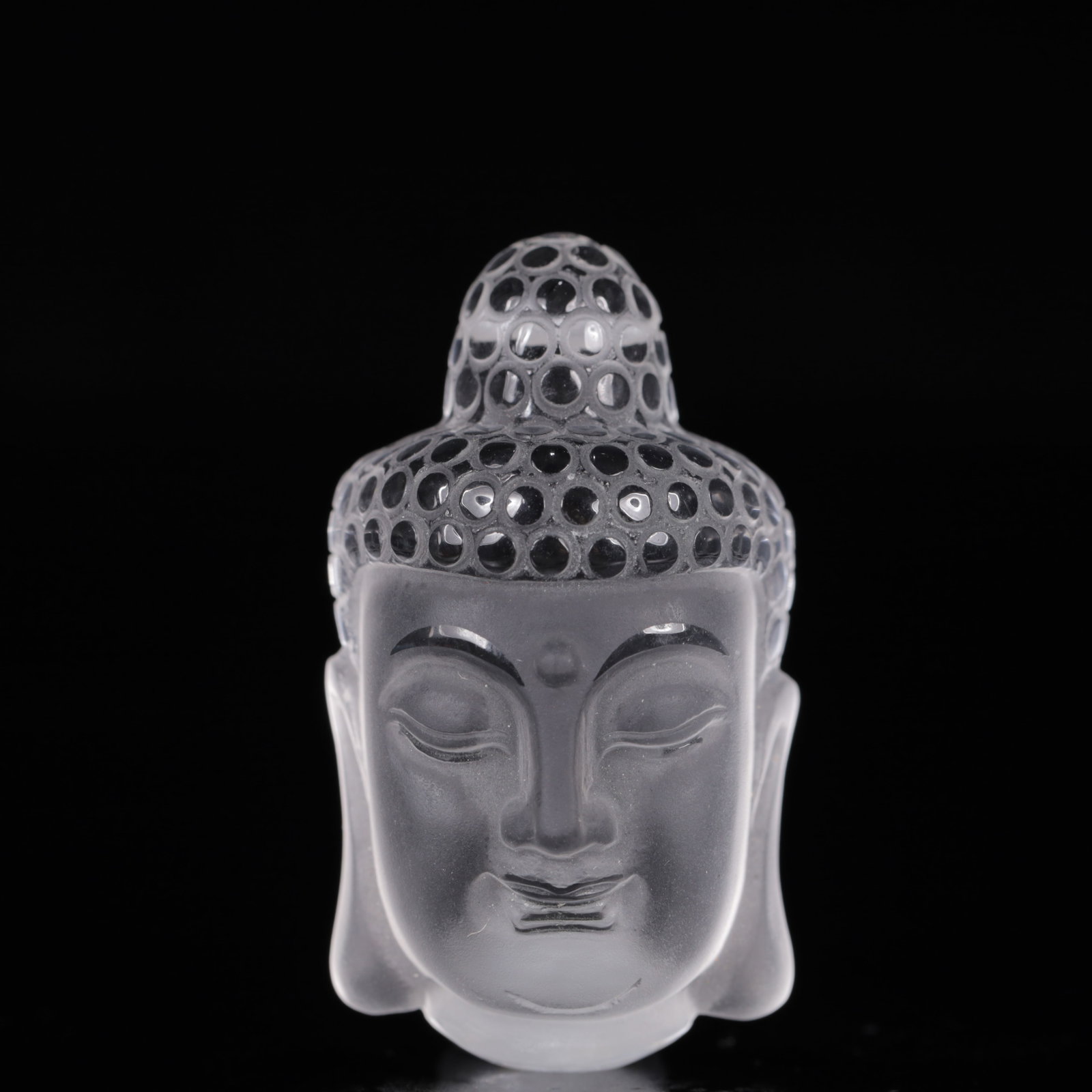 An Exquisite Crystal Statue of Sakyamuni Head: An Exquisite Crystal Statue of Sakyamuni Head,Size:1.2inx0.8inx1.8in,Weight:31g 水晶如来头