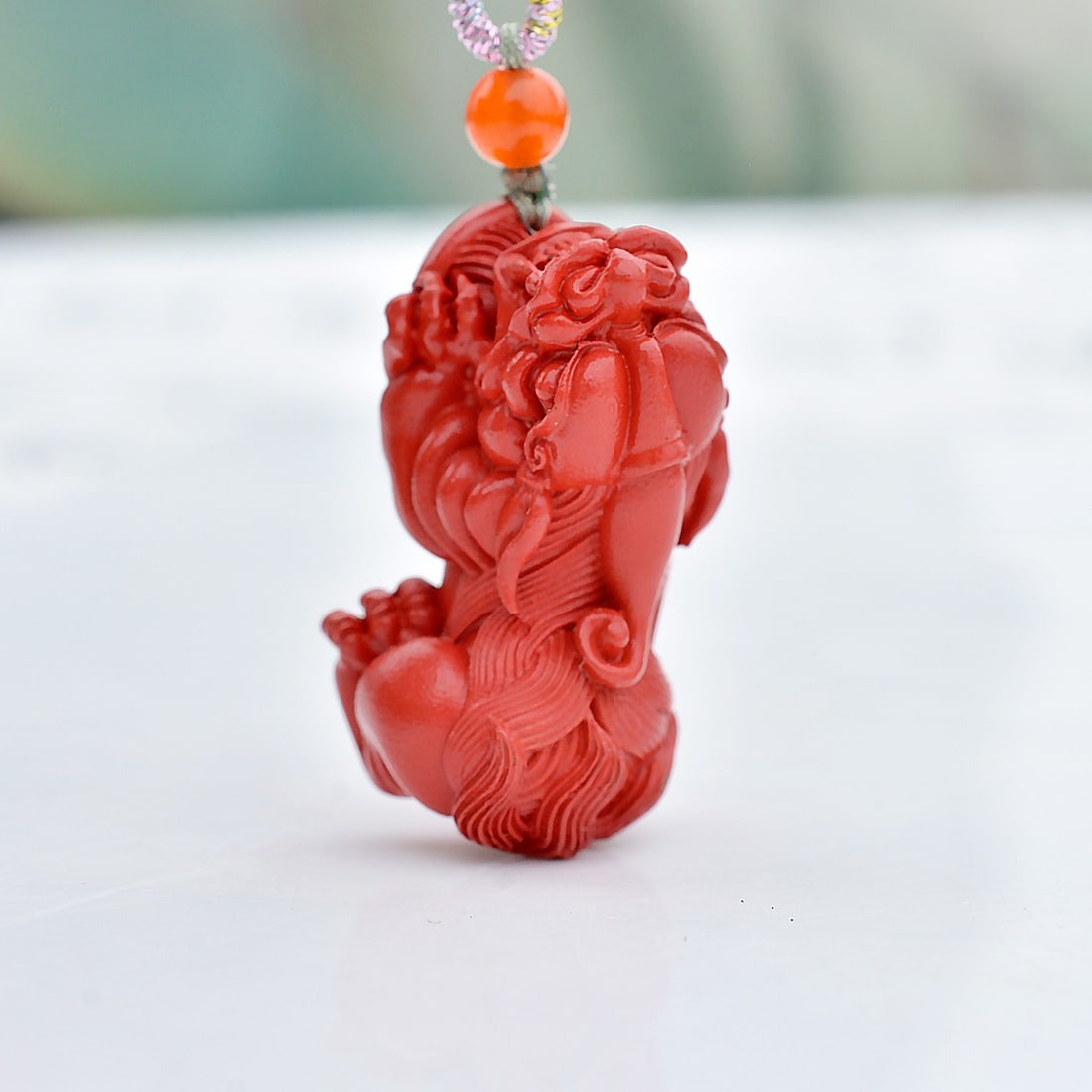 An Exquisite Cinnabar Auspicious Beast Pendant: An Exquisite Cinnabar Auspicious Beast Pendant,Size:14mmx25mm