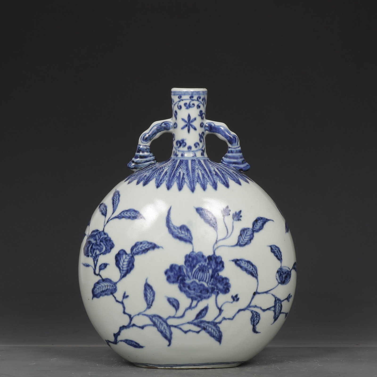 An Exquisite Blue and White Flower Pattern Double-Ears Vase: An Exquisite Blue and White Flower Pattern Double-Ears Vase,Ming Dynasty,China,Size:10.9inx8.5in 青花花卉纹双耳瓶,中国明代
