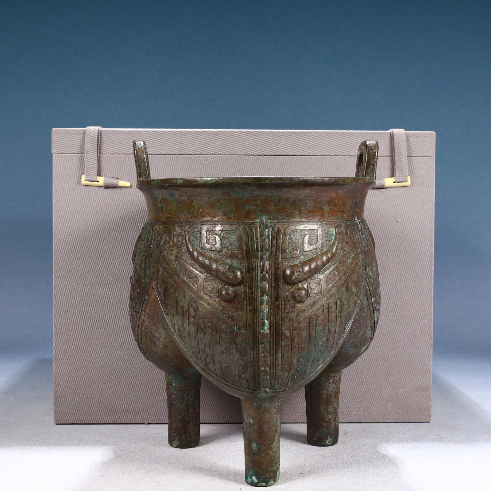 An Archaic Bronze Beast-Face Pattern Double-Ears and Tripod Censer: An Archaic Bronze Beast-Face Pattern Double-Ears and Tripod Censer,Qing Dynasty, China,Size:6.7inx9.4in,Weight:2450g 青铜兽面纹双耳三足香