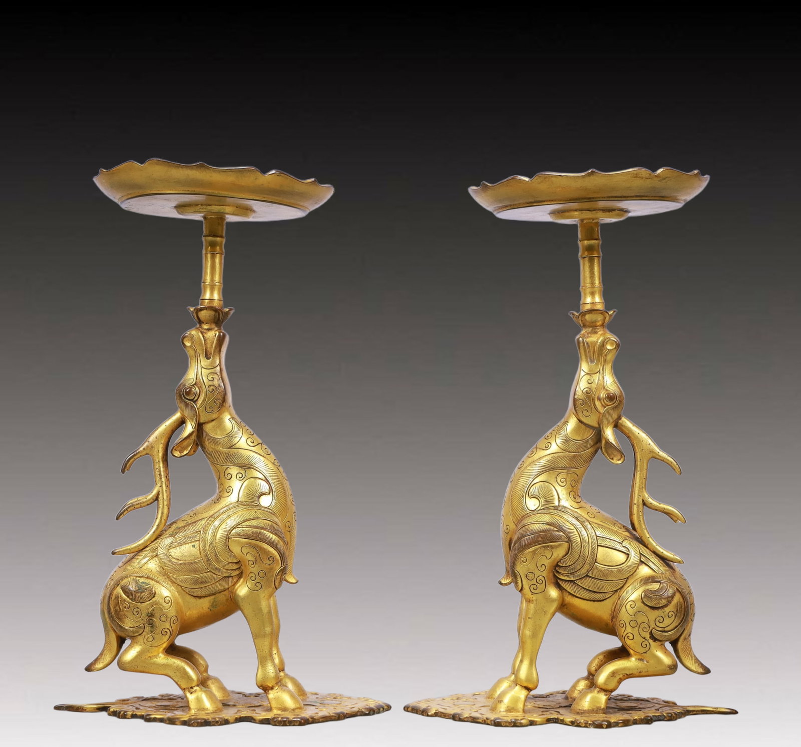 A Pair of Exquisite Gilt Bronze Deer Candlesticks: A Pair of Exquisite Gilt Bronze Deer Candlesticks,Ming Dynasty, China,Size:5.9inx3.5inx9.1in Weight:2050g 一对铜鎏金鹿烛台,中国明É