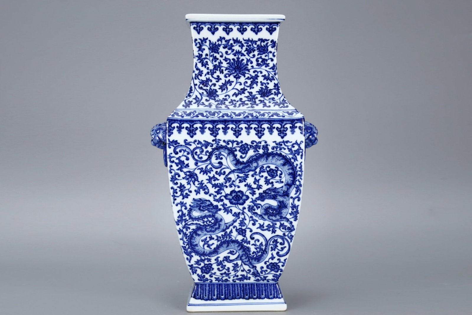 A Huge Blue and White Lotus and Dragon Pattern Beast-Ears Vase: A Huge Blue and White Lotus and Dragon Pattern Beast-Ears Vase,Qing Dynasty,China,Qianlong Six-character Mark,Size:16.9inx7.9in 青花缠枝莲龙纹兽耳
