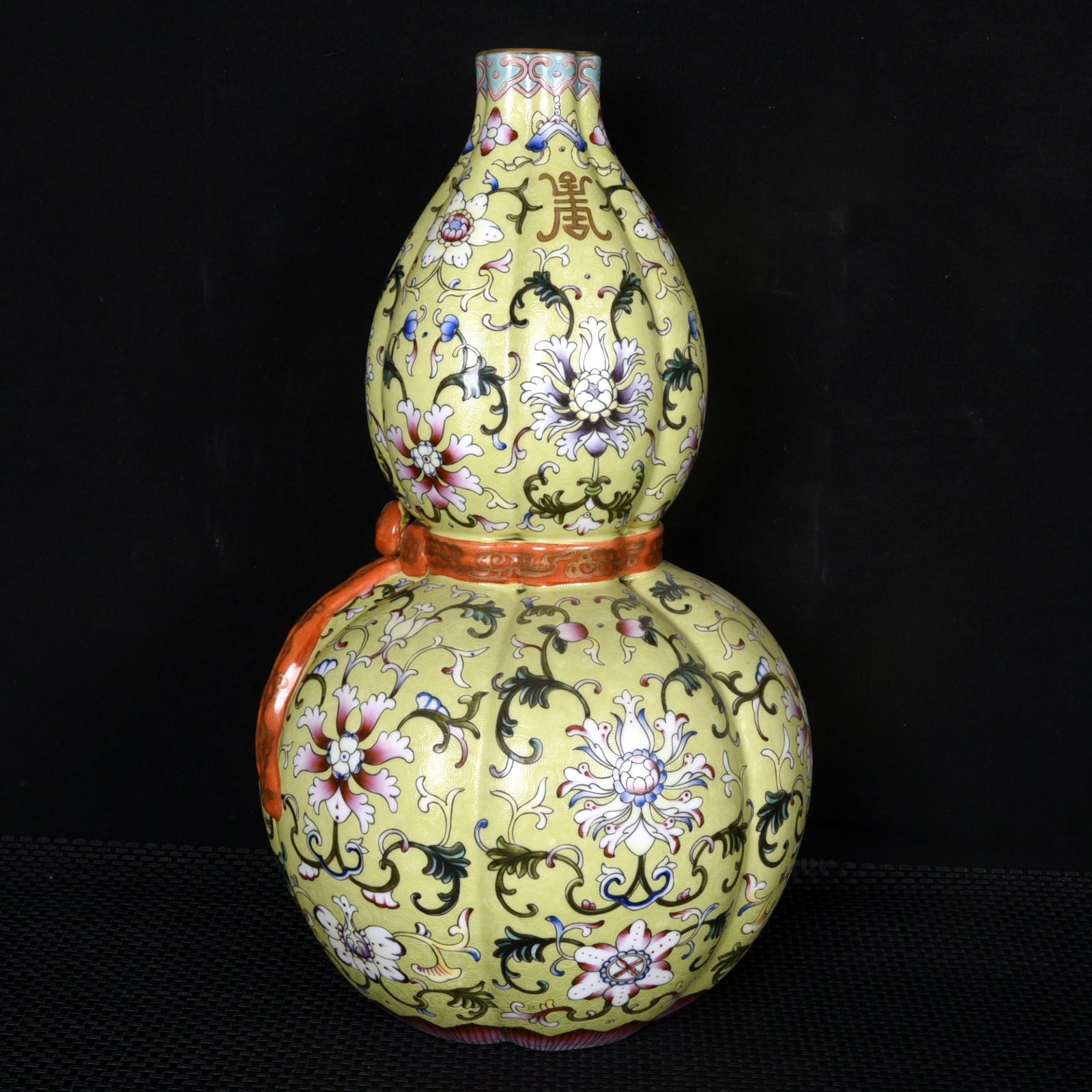 A Rare Green Ground Enamel Lotus Pattern Gourd-Shaped Vase: A Rare Green Ground Enamel Lotus Pattern Gourd-Shaped Vase,Qing Dynasty,China,Qianlong Four-character Mark,Size:14.6inx8.7in 绿地珐琅彩缠枝莲纹