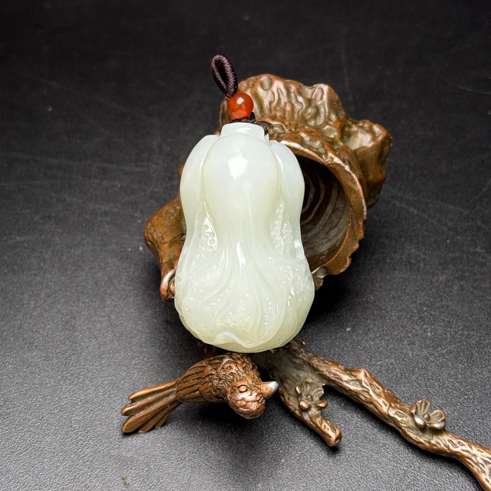 An Exquisite White Jade Cabbage Pendant: An Exquisite White Jade Cabbage Pendant,Qing Dynasty,China,Size:28mmx27mmx44mm,Weight:47g 白玉白菜挂件,中国清代